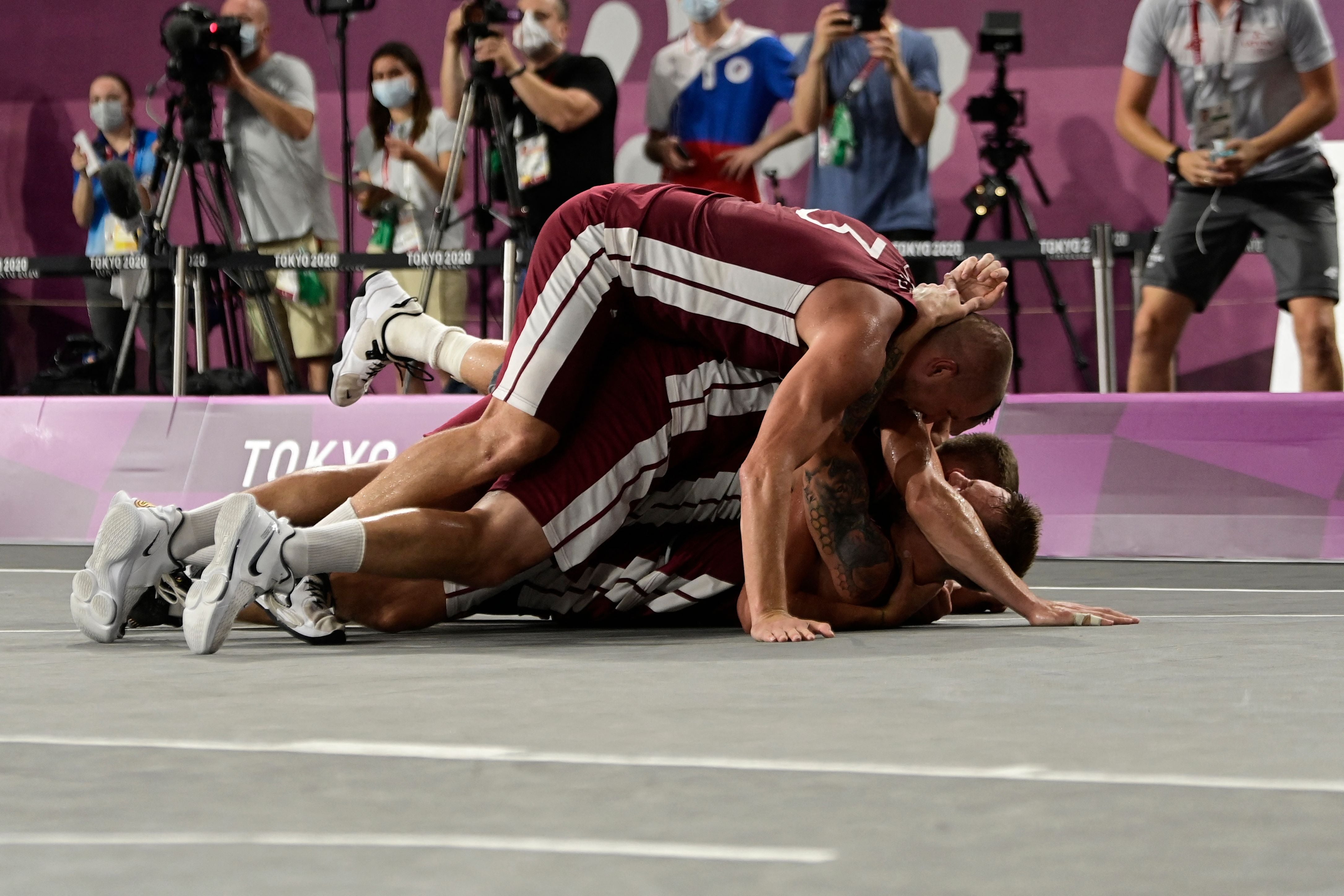 Latvia celebrate their dramatic gold-winning performance in the men’s 3x3 final