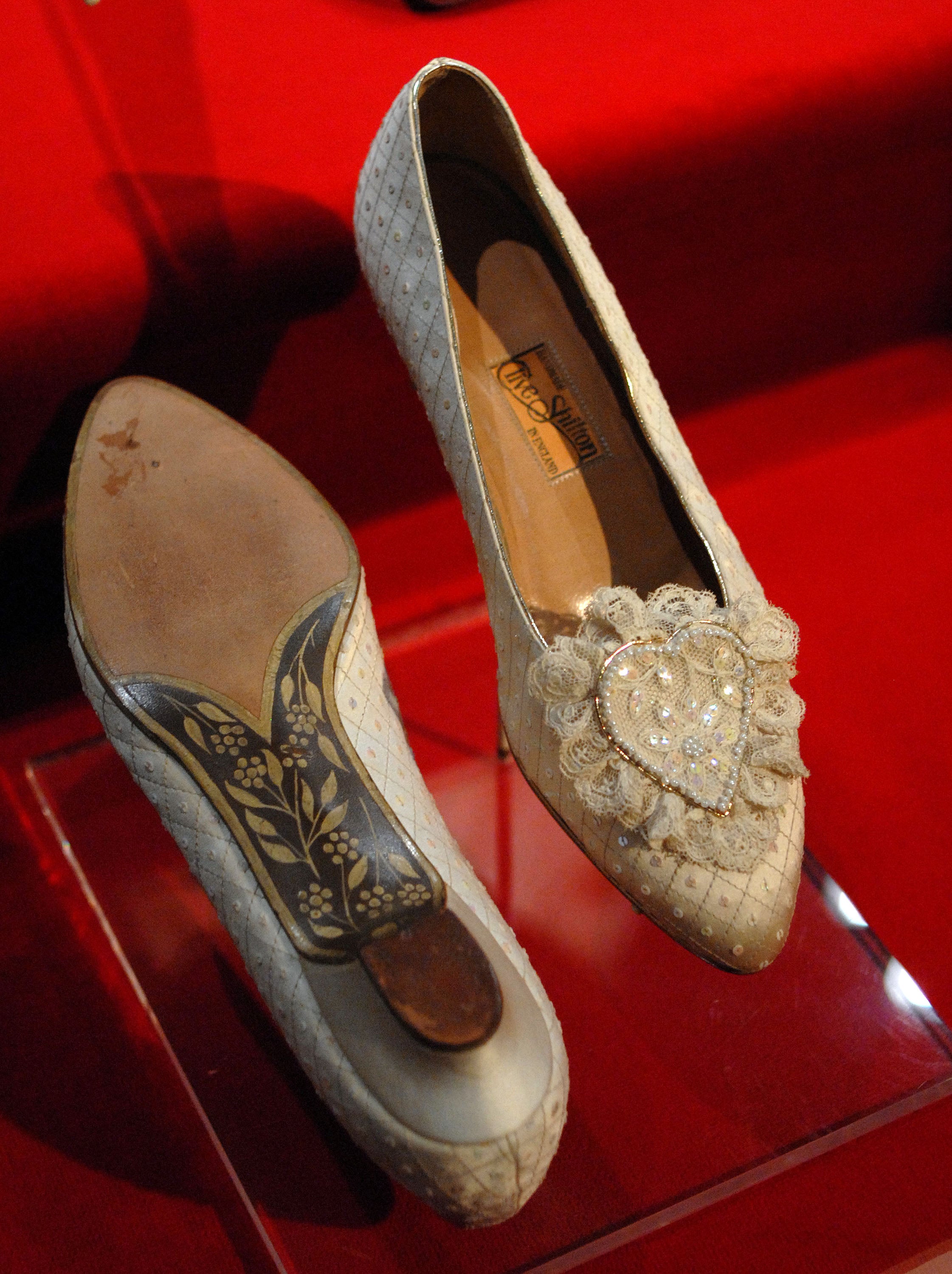 Princess Diana’s wedding slippers are displayed at a preview of the traveling “Diana: A Celebration” exhibit at the National Constitution Center in Philadelphia, Pennsylvania