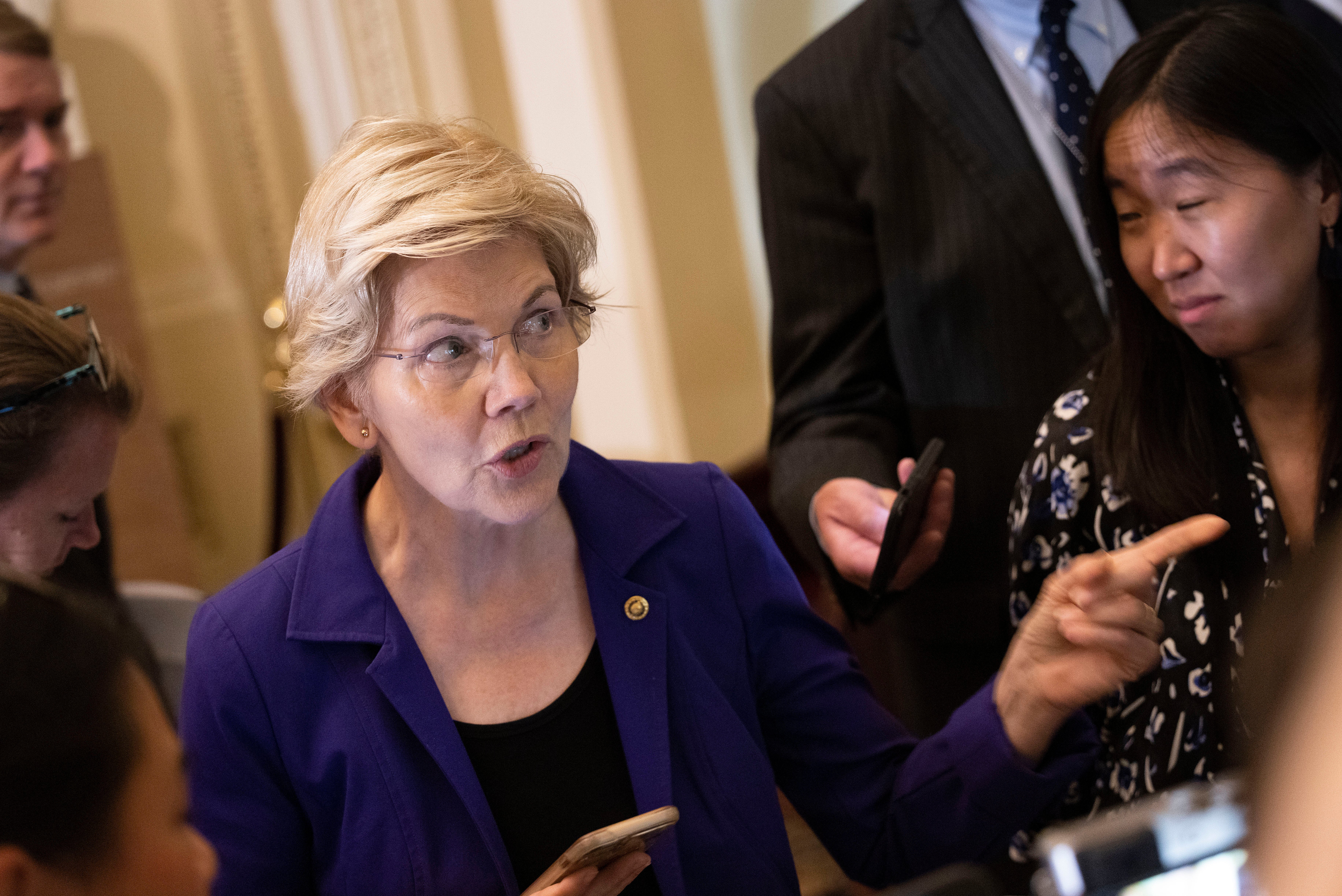 Elizabeth Warren and billionaire Ken Lagone squared off on CNBC Wednesday