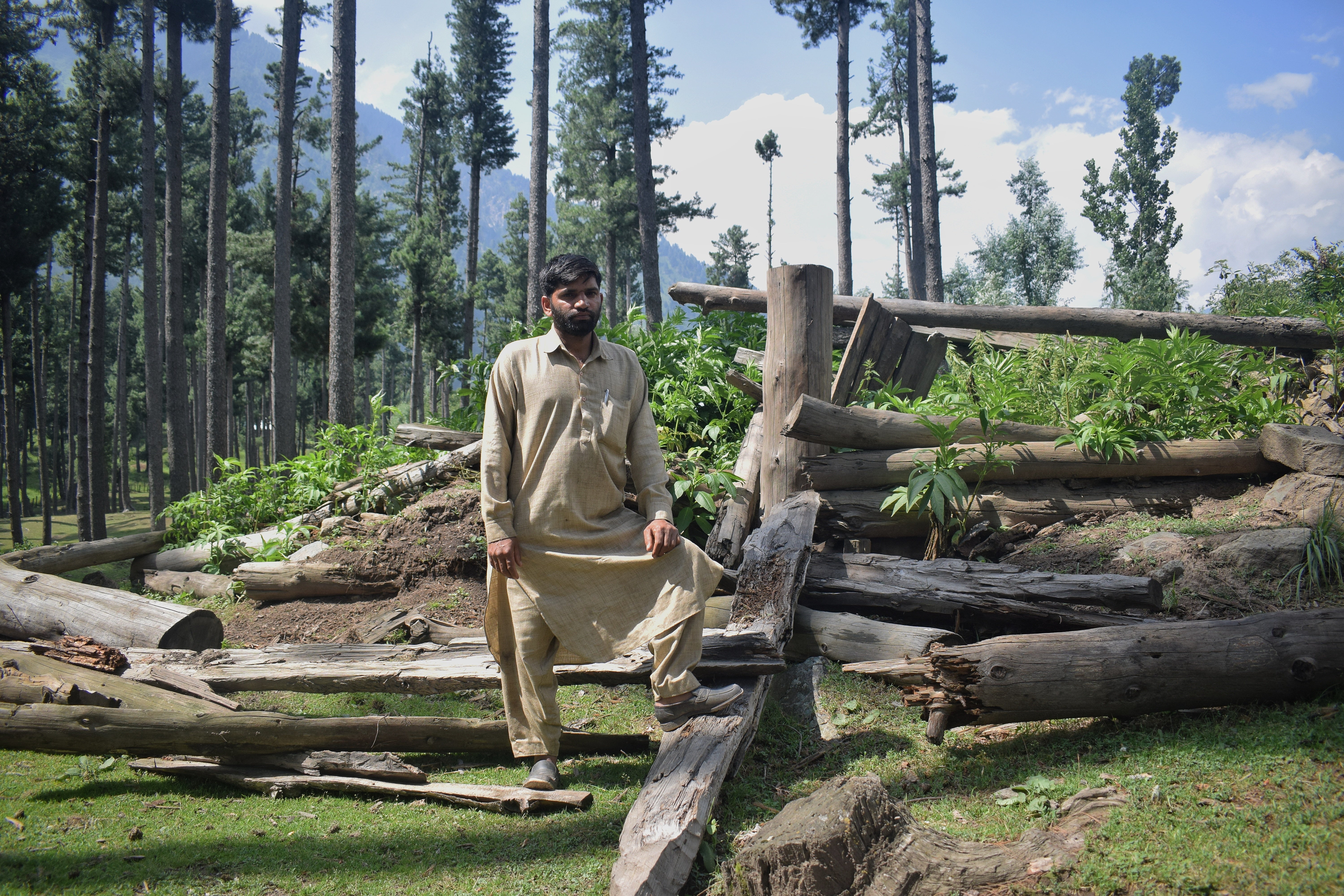 Abdul Aziz Khattana stands near his demolished hut in Lidroo, Pahalgam. Seven similar huts were razed to ground in Lidroo alone