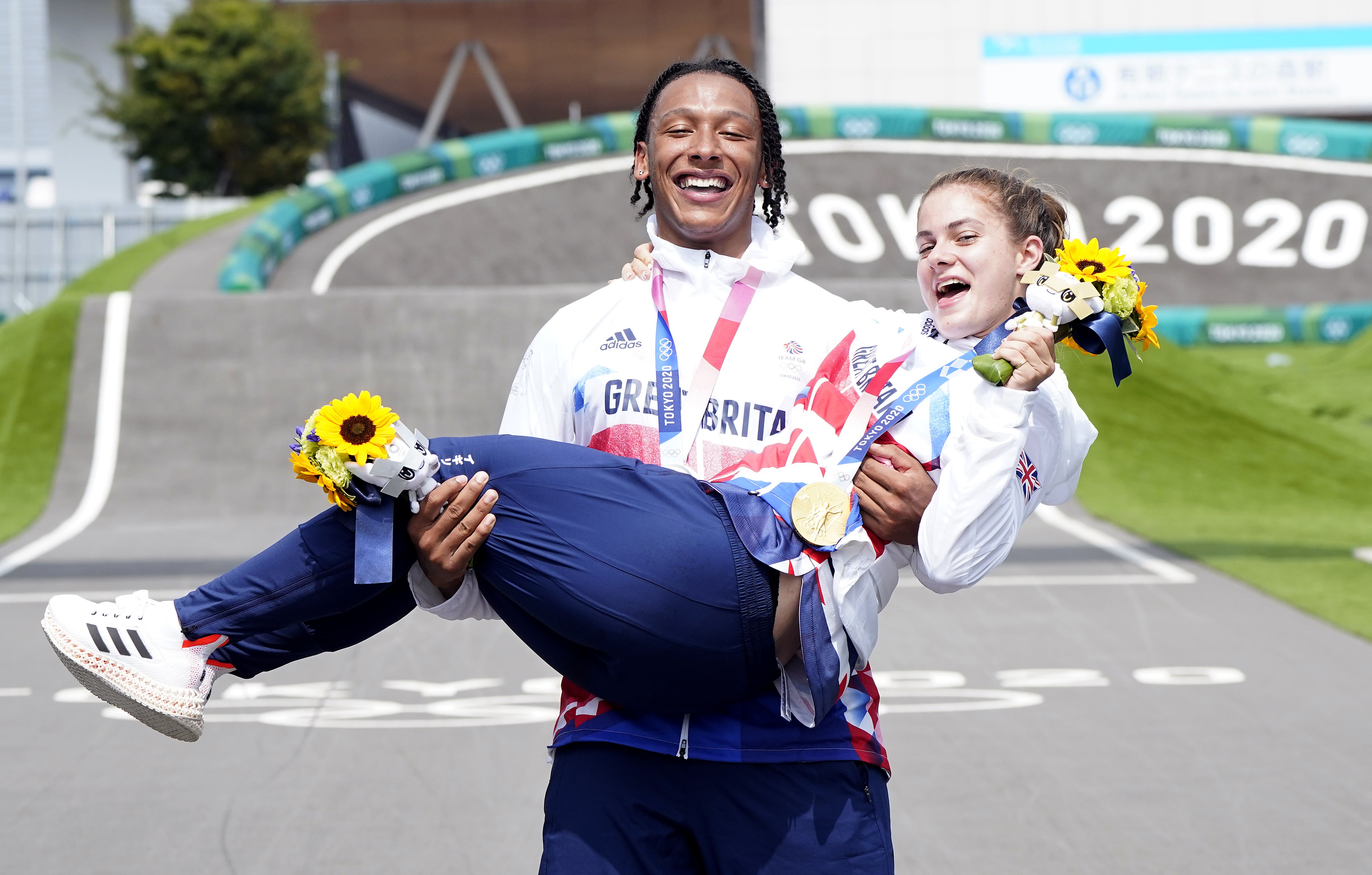 Bethany Shriever and Kye Whyte celebrate their medals