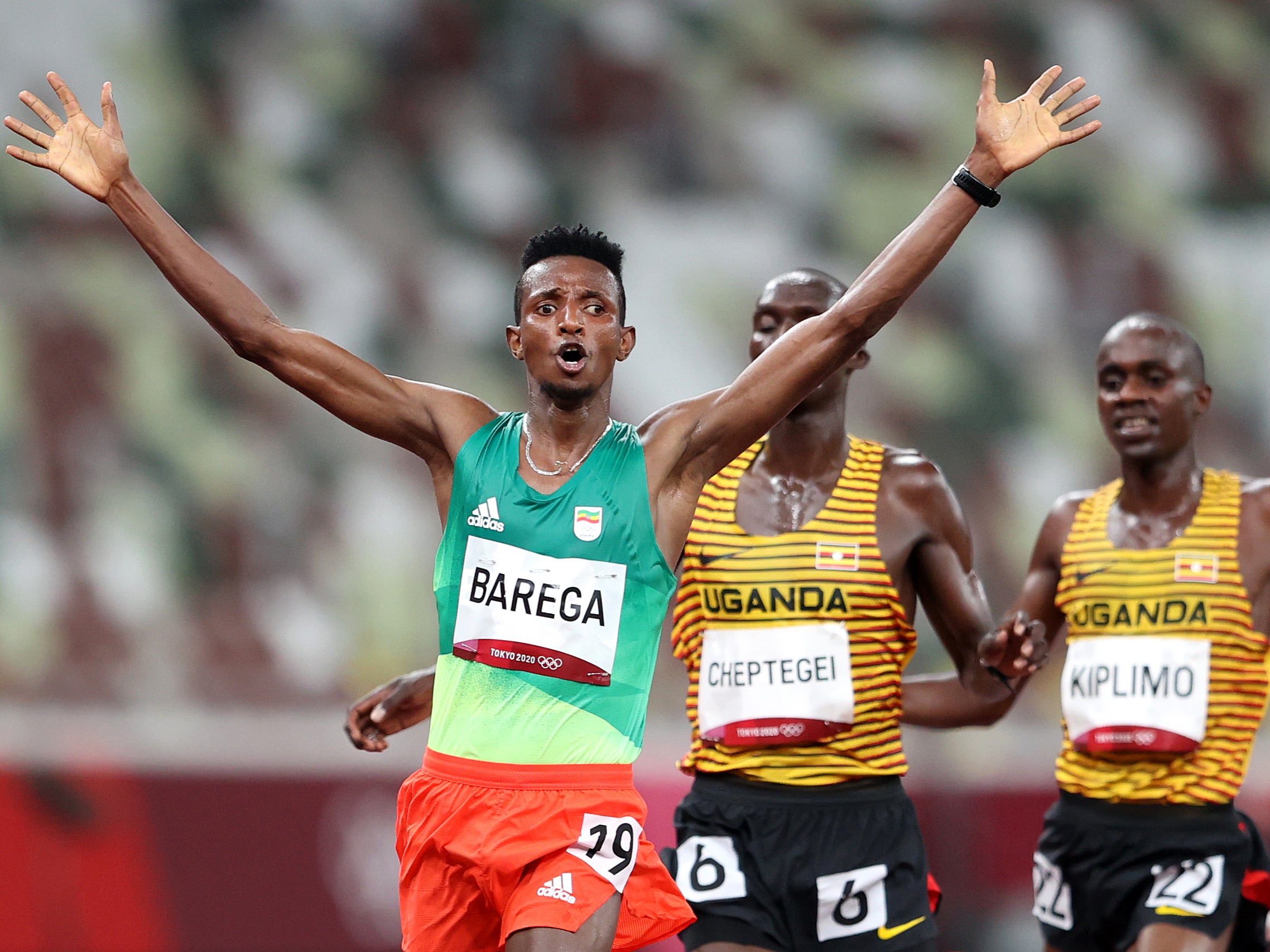 Selemon Barega of Team Ethiopia celebrates as he crosses the finish line