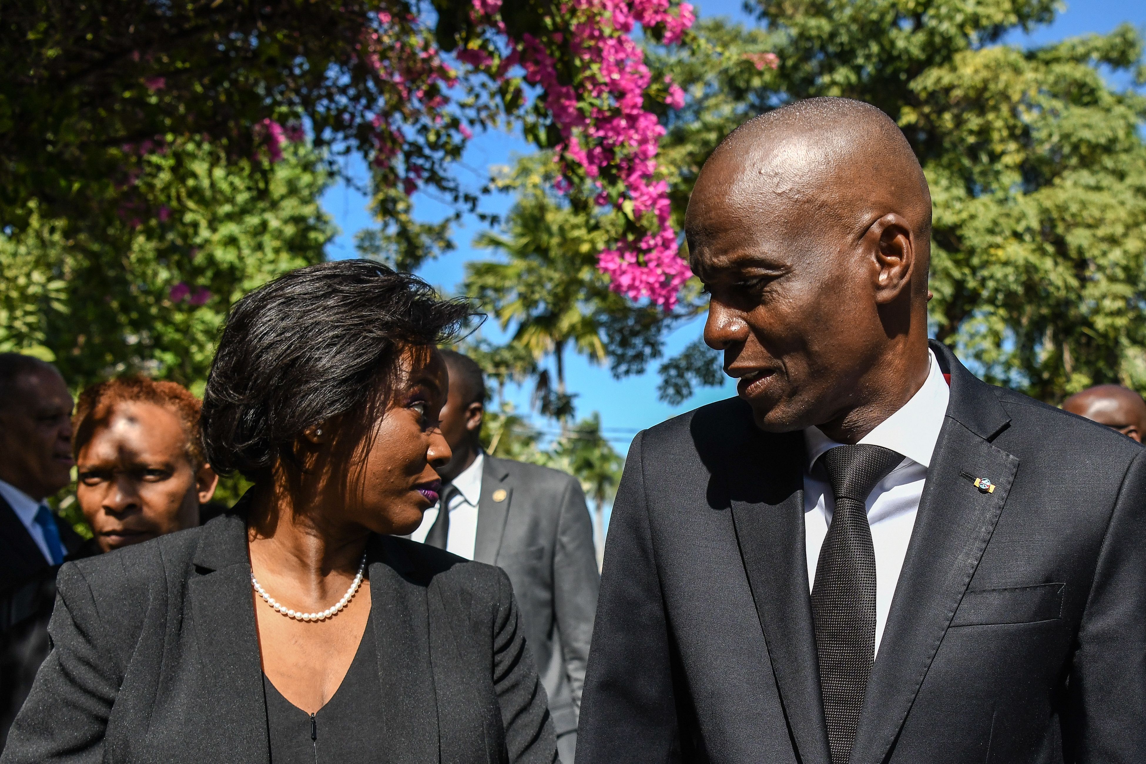 Martine Moïse (L) lost her husband President Jovenel Moïse (R) in an assassination