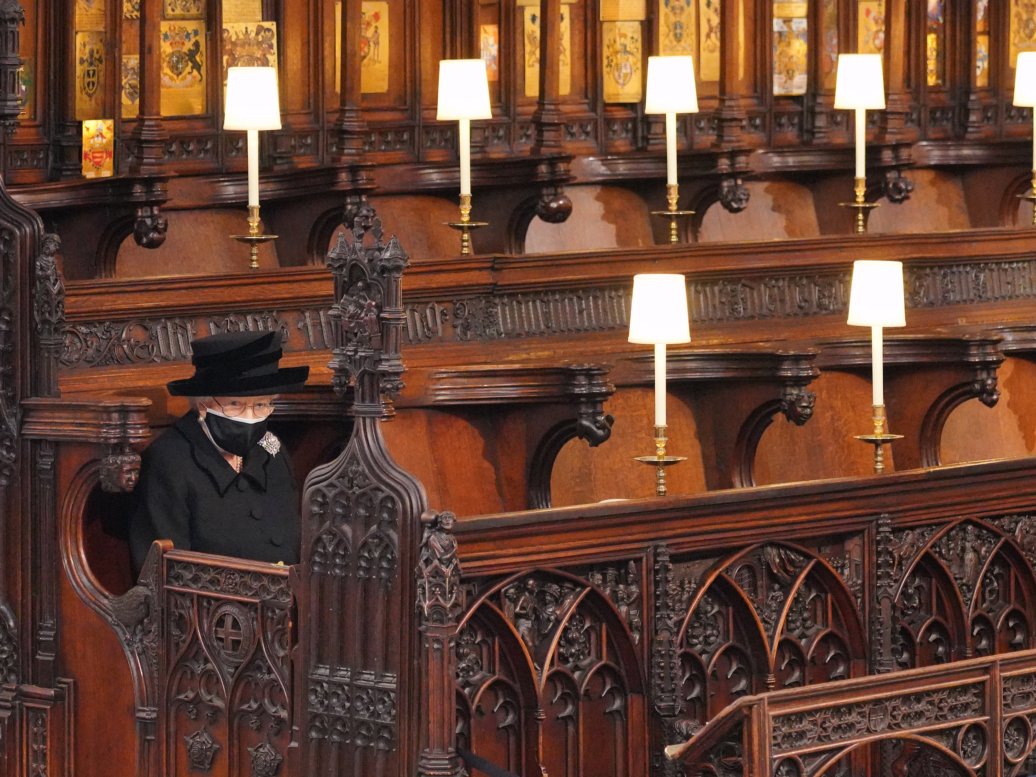 The Queen sits alone during Prince Philip’s funeral