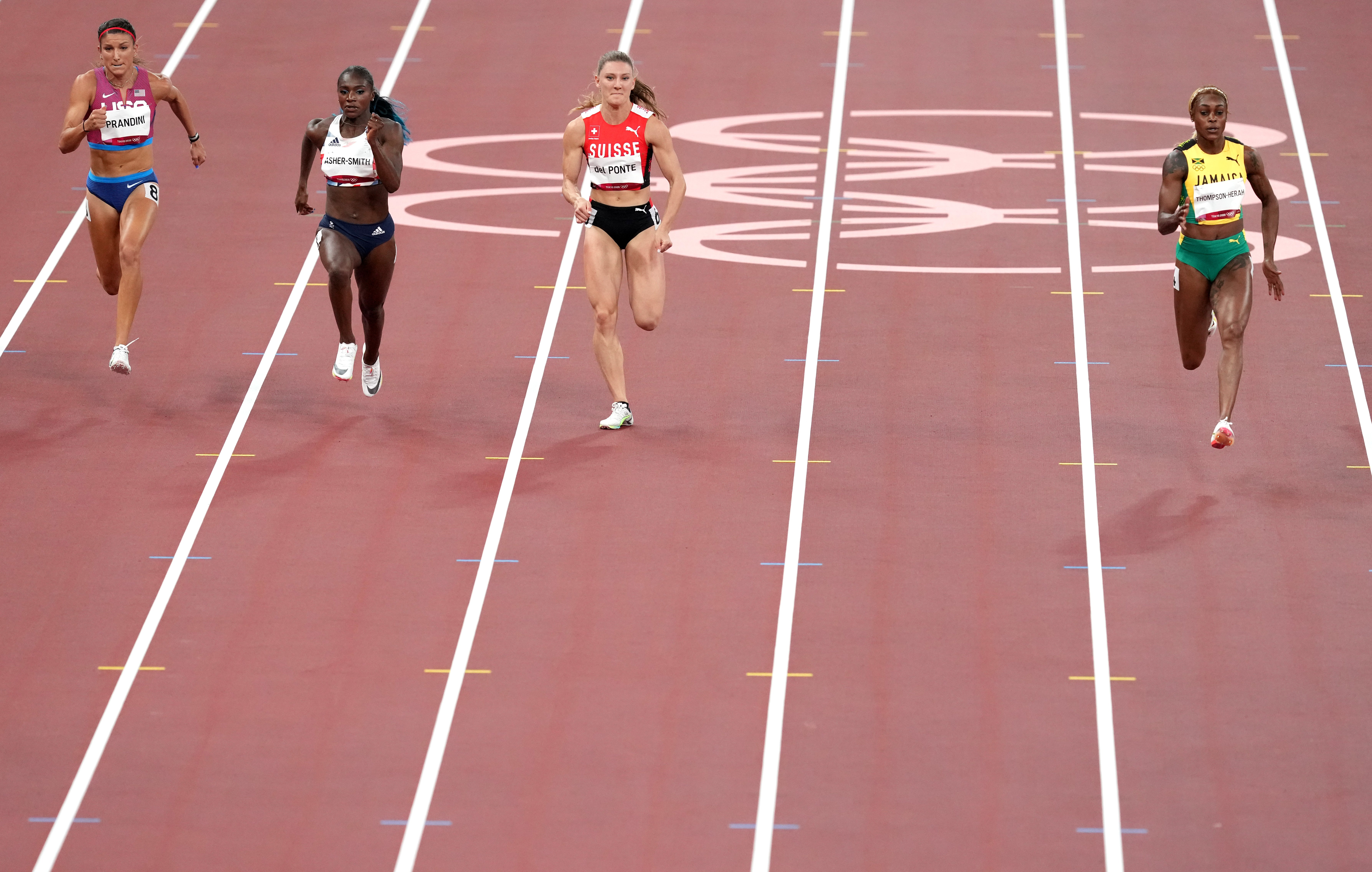 Dina Asher-Smith, second left, had to settle for third in her semi-final (Martin Rickett/PA)