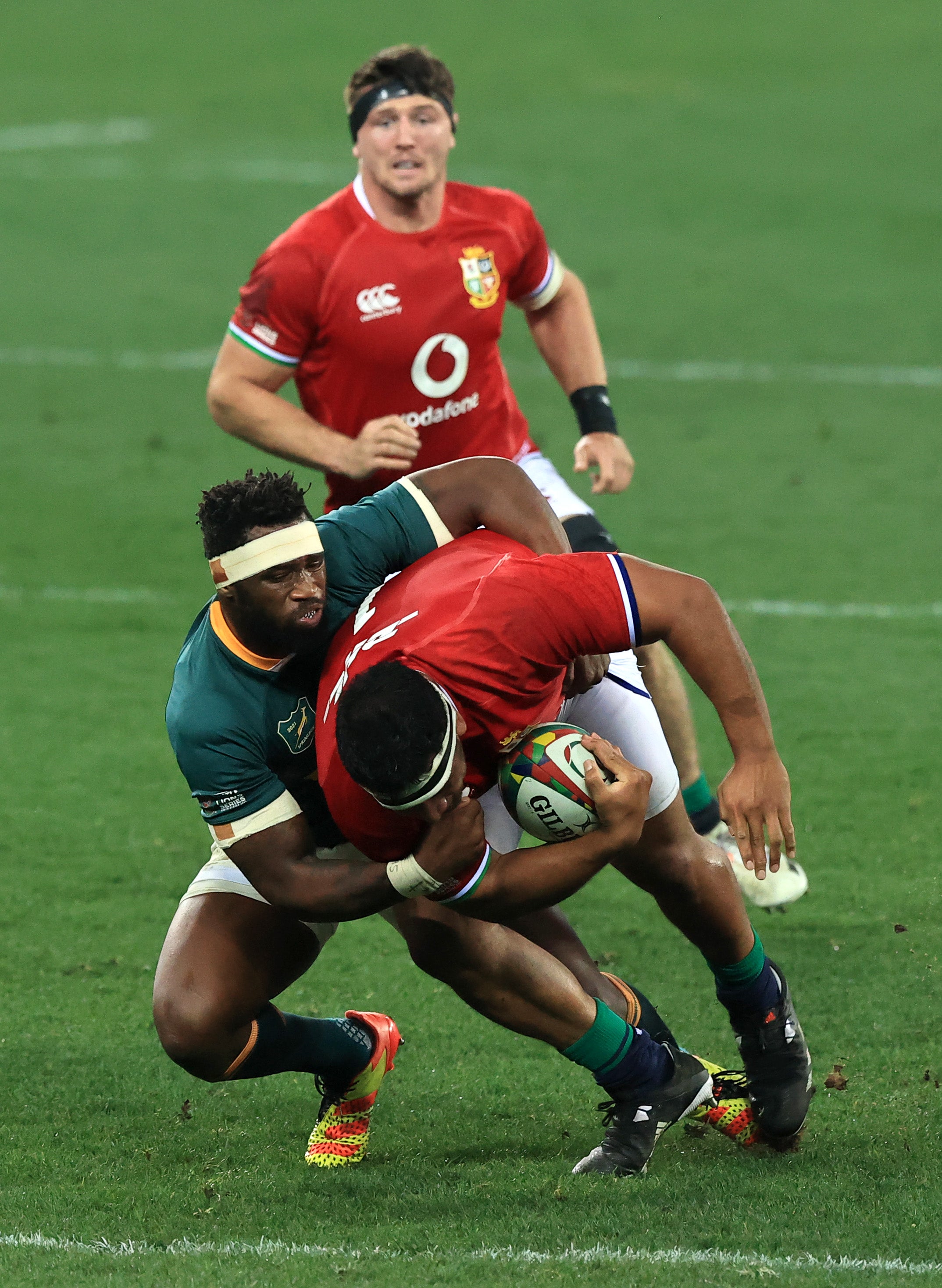 Mako Vunipola of British & Irish Lions is tackled by Siya Kolisi of South Africa Springboks