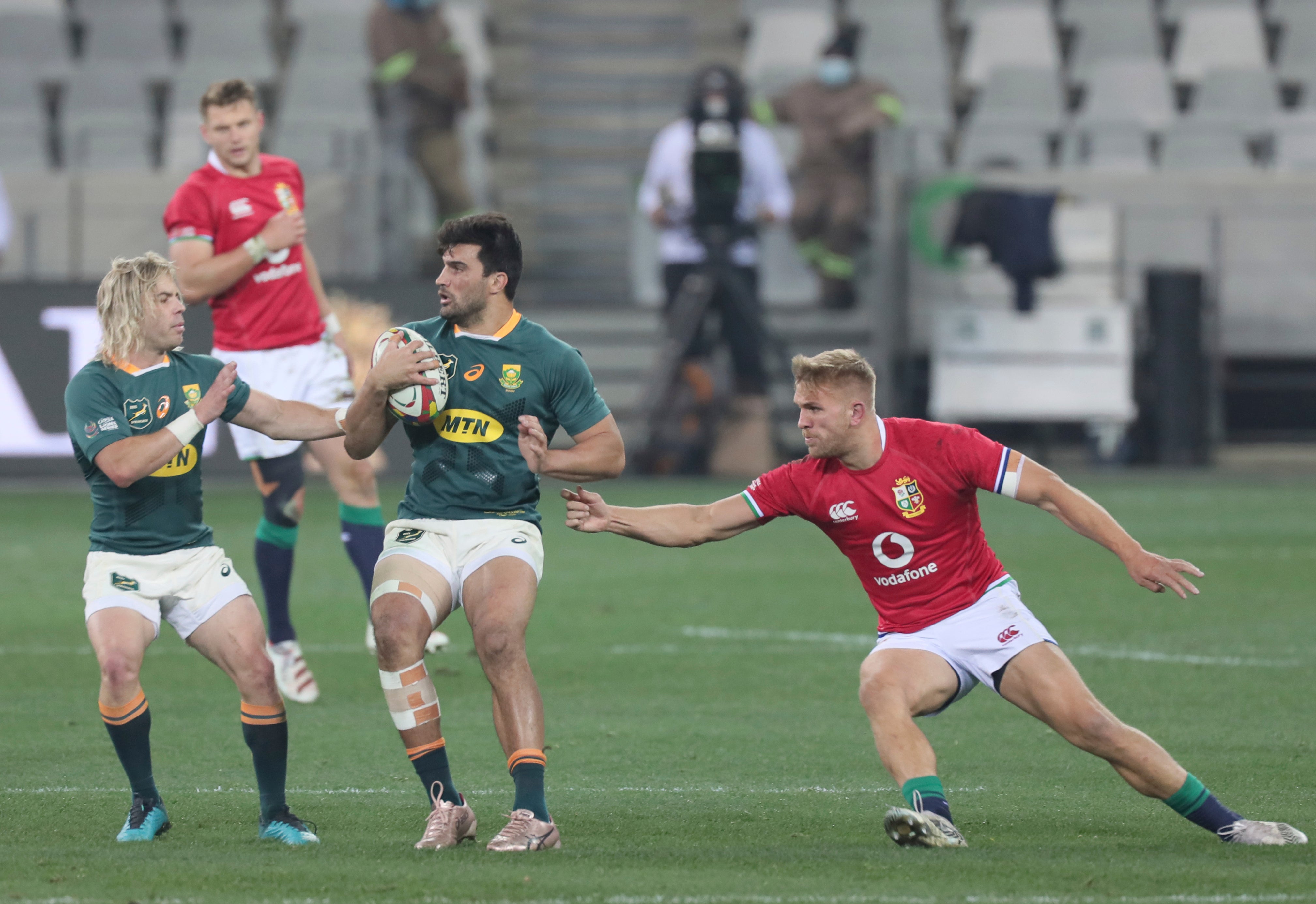 South Africa’s South Africa’s Damian de Allende is tackled by British and Irish Lions’ Chris Harris