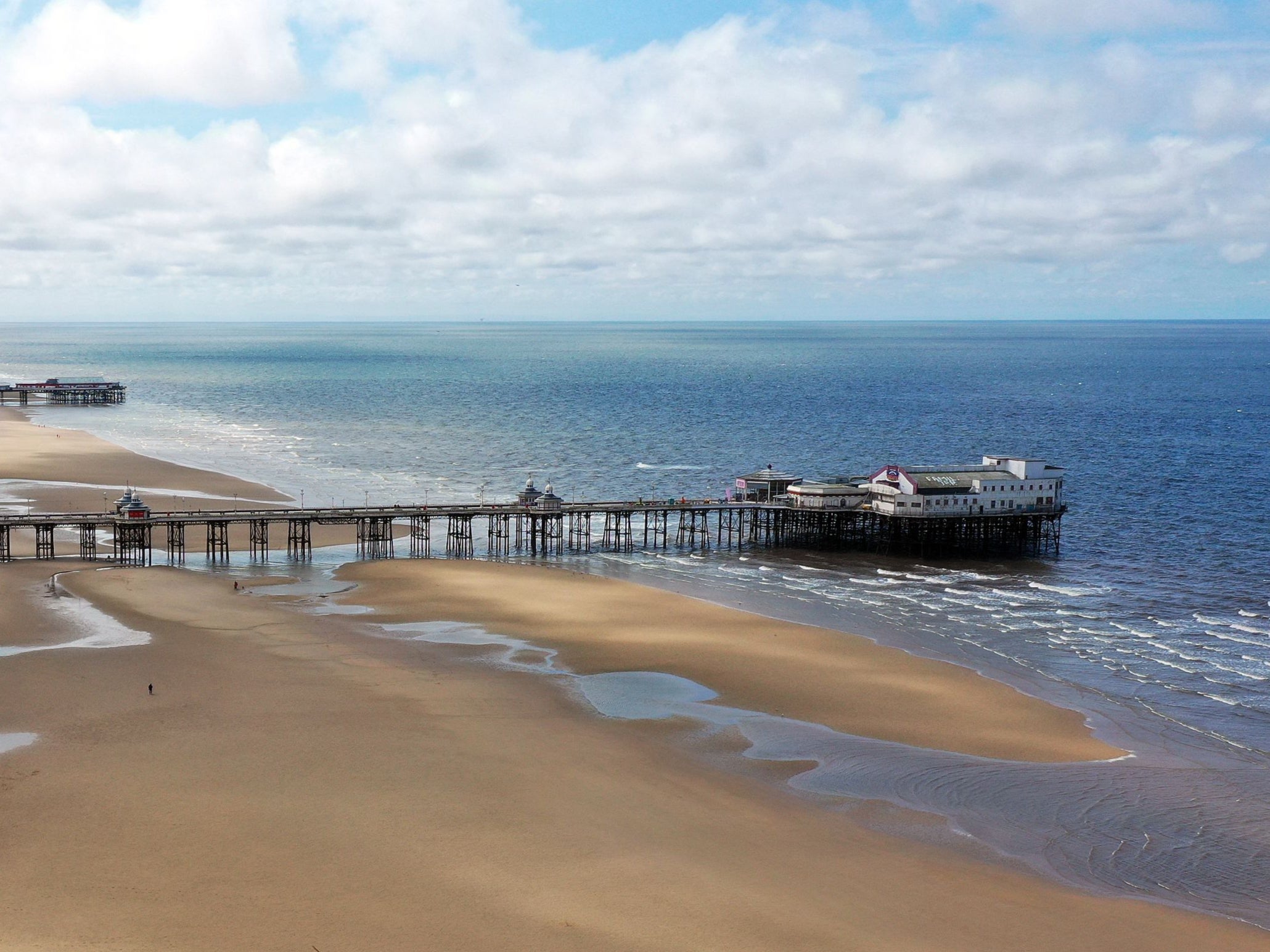 Alex Gibson, 22, jumped into the water close to the North Pier in Blackpool at around 4.20am on Friday morning