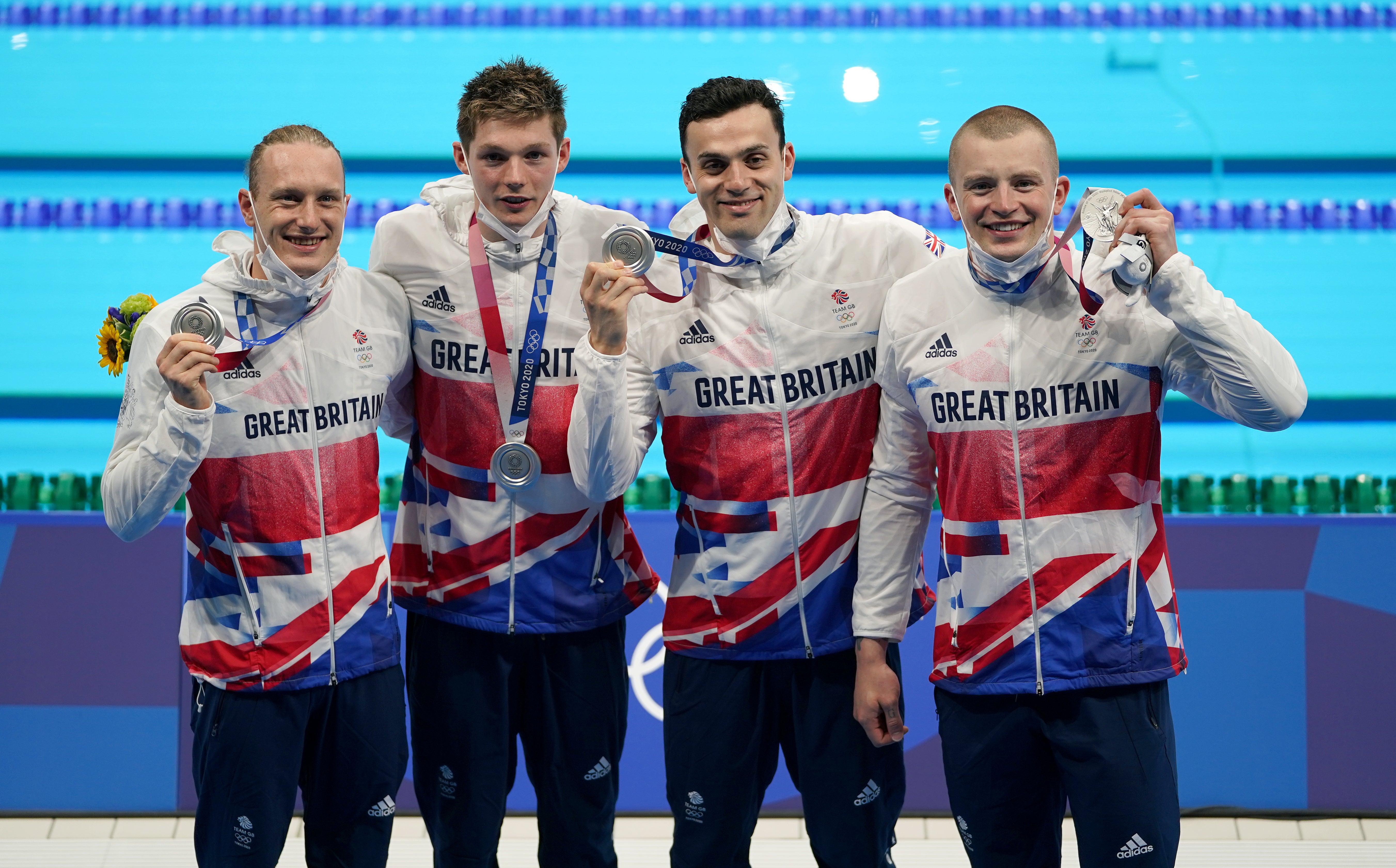 It was silver for Luke Greenbank, Duncan Scott, James Guy and Adam Peaty (Joe Giddens/PA)