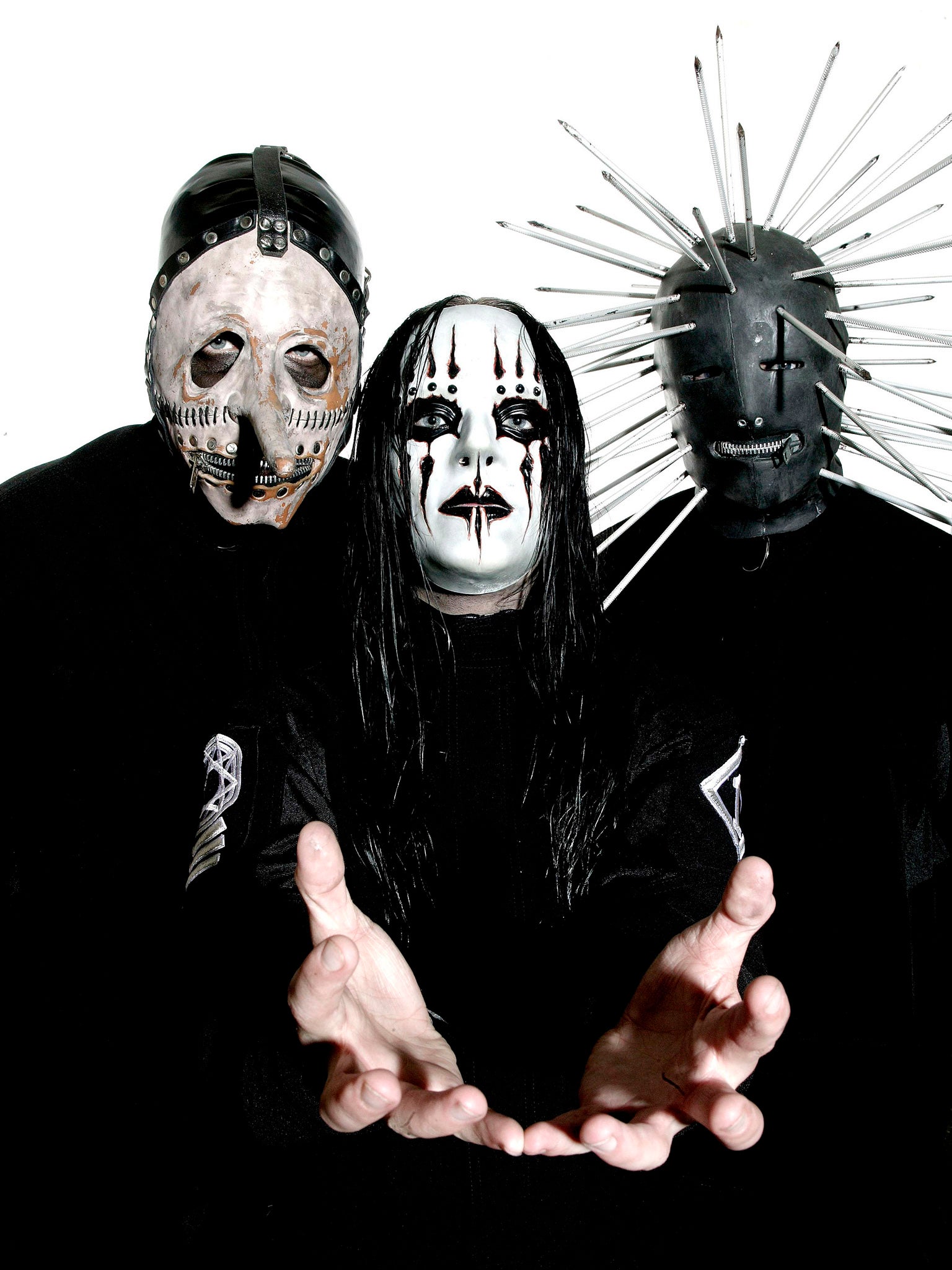 Jordison (centre) with bandmates Chris Fehn (left) and Craig Jones, circa 2000