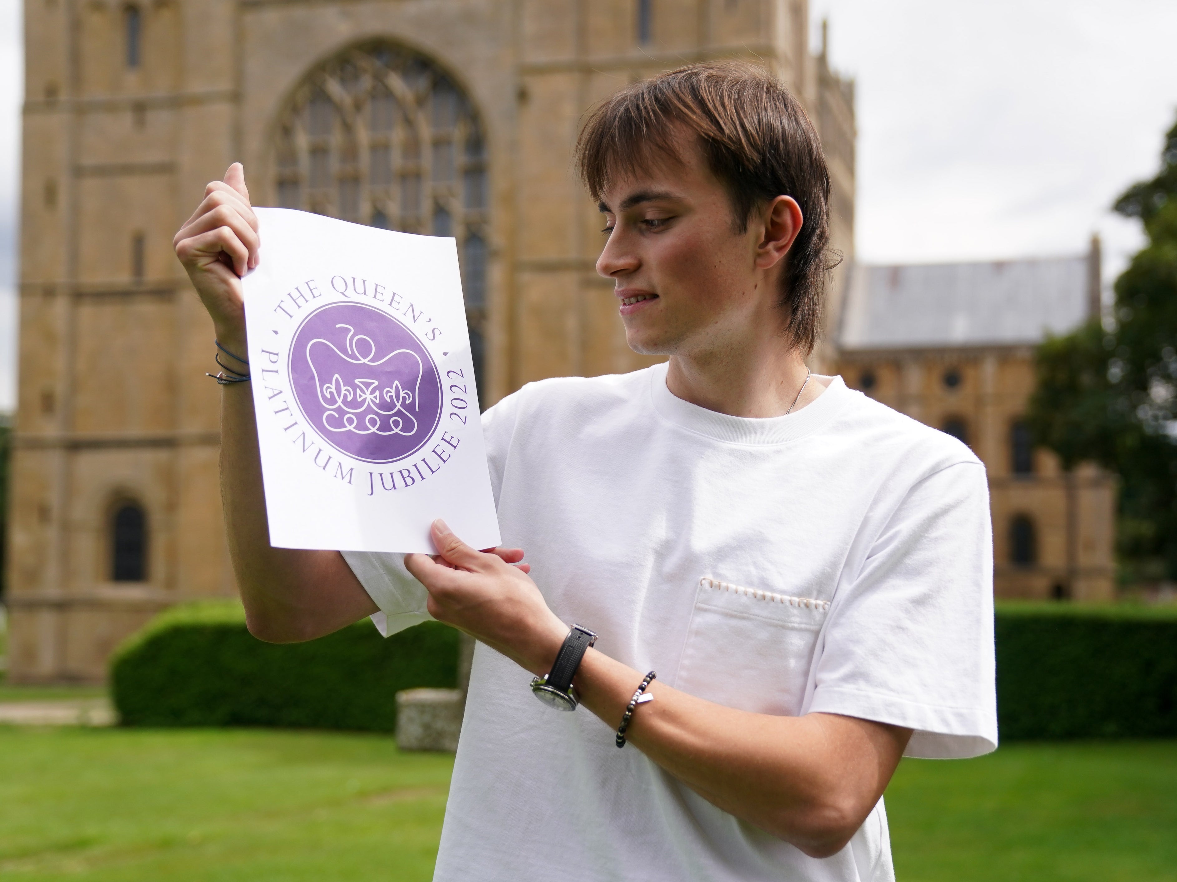 Edward Roberts with his winning design for Queen’s Platinum Jubilee emblem