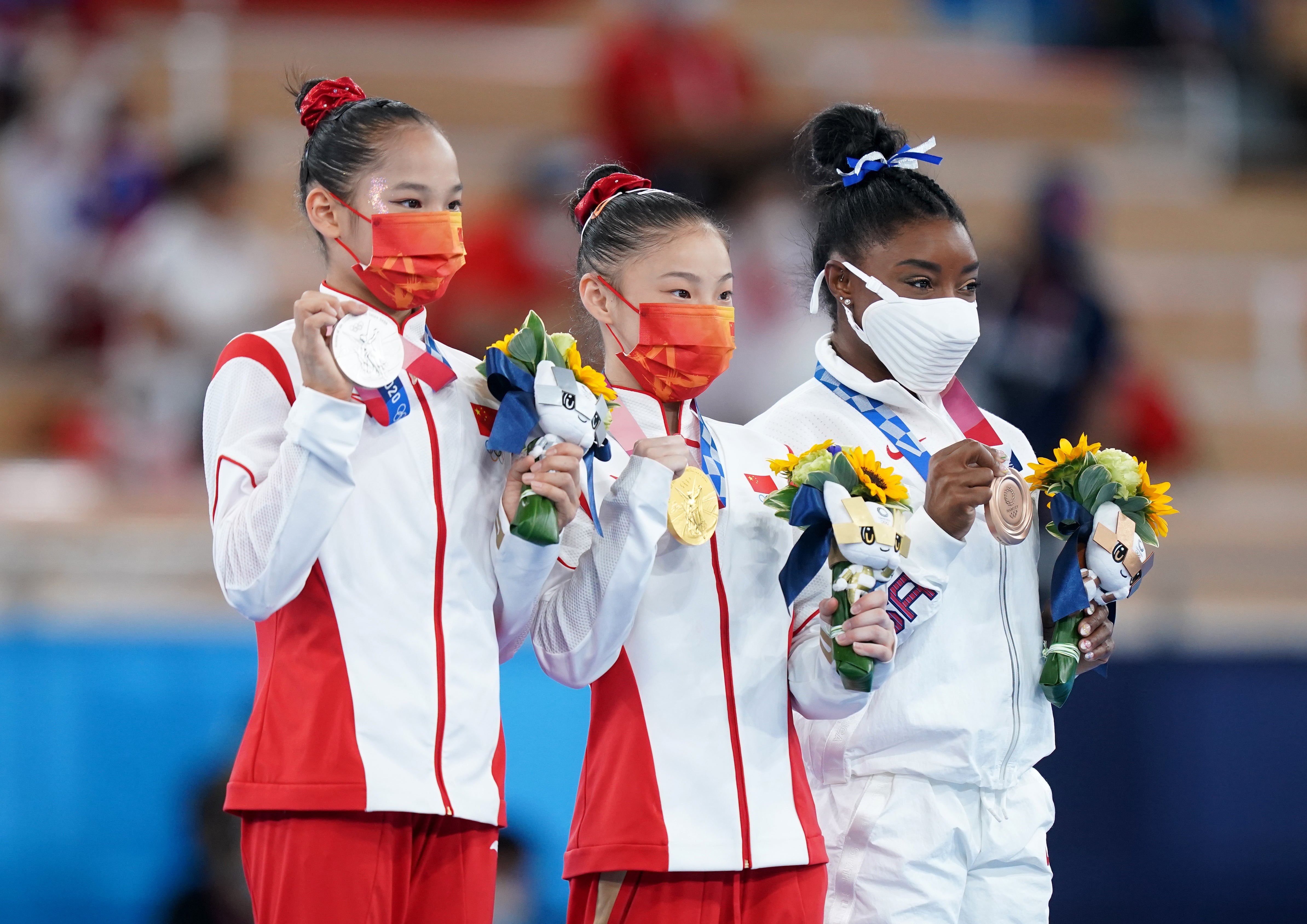 Simone Biles took bronze behind Chinese pair Chenchen Guan and Xijing Tang (Mike Egerton/PA)