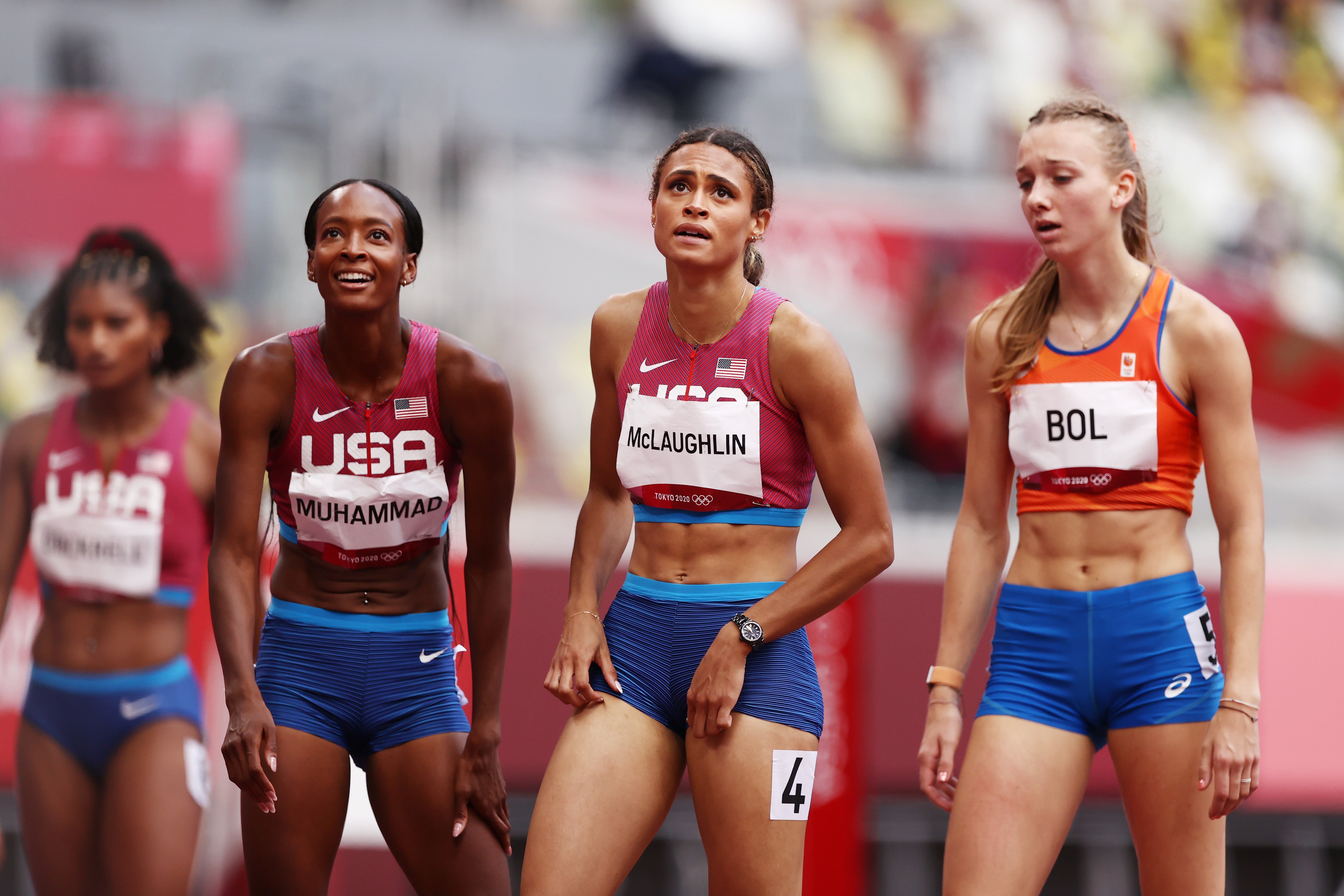 Silver medalist Dalilah Muhammad of Team United States, gold medalist Sydney McLaughlin of Team United States and bronze medalist Femke Bol of Team Netherlands