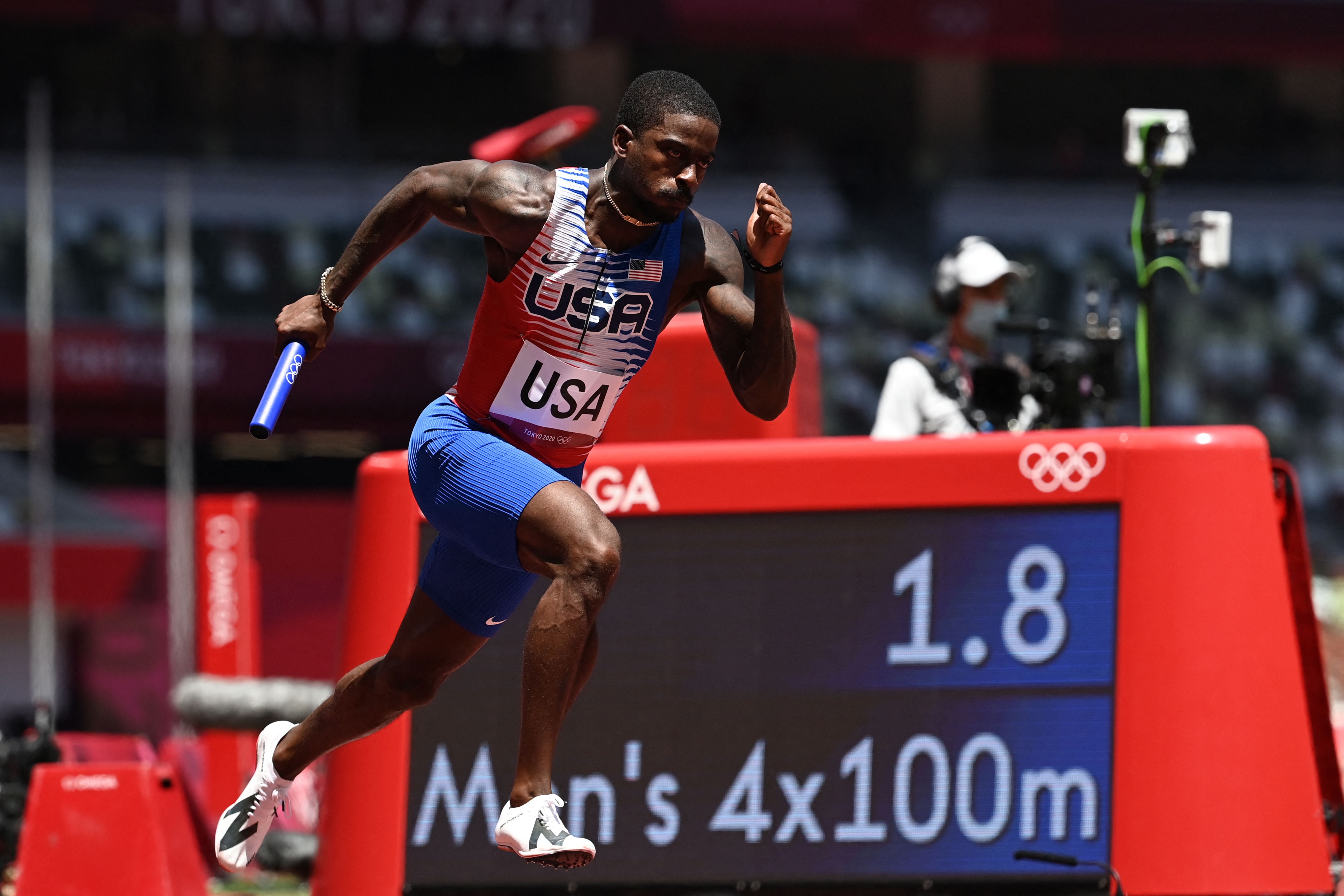 Trayvon Bromell competes in the men’s 4x100m relay heats