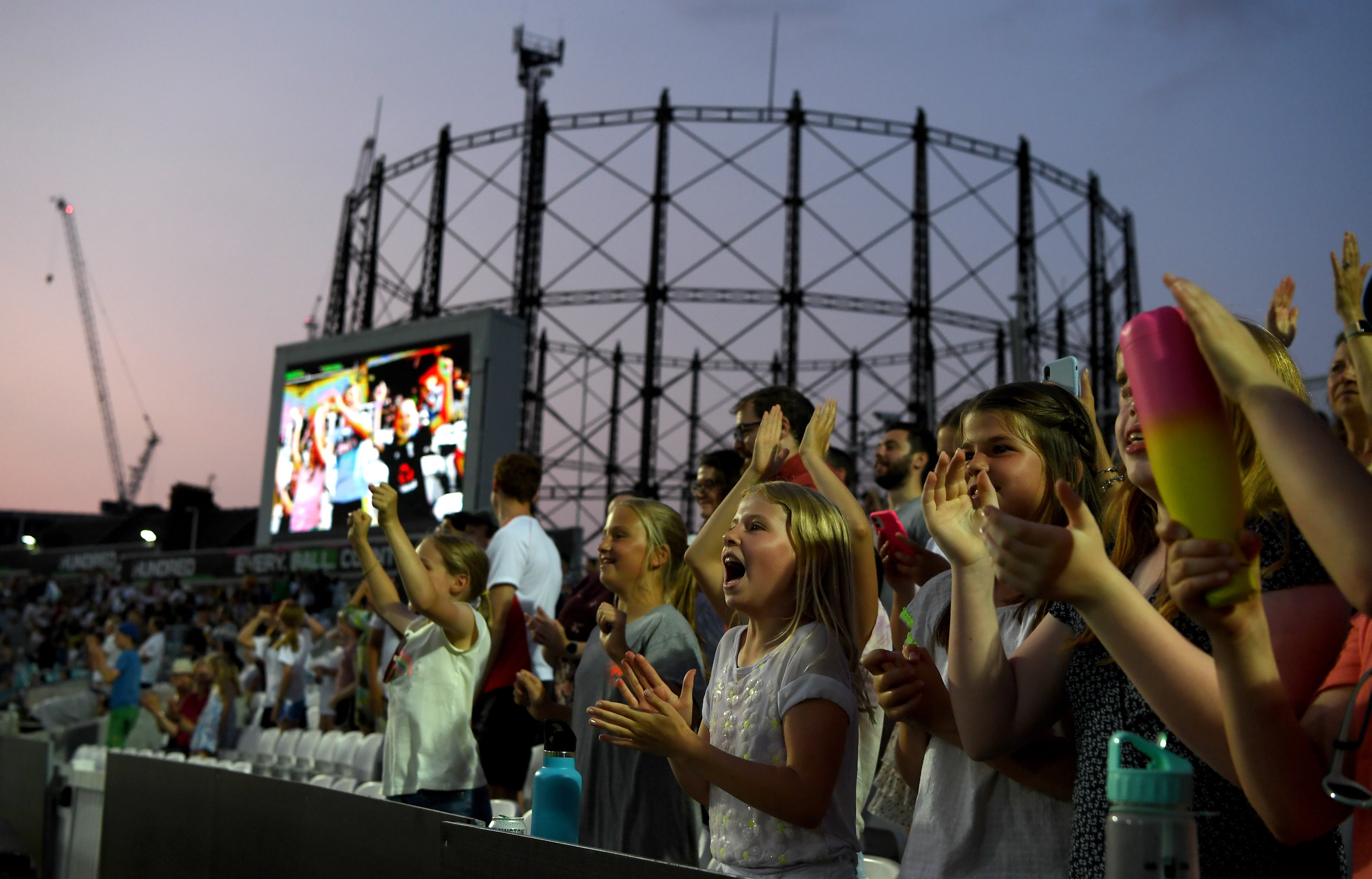 Cricket fans cheer during the match between Oval Invincibles and Manchester Originals