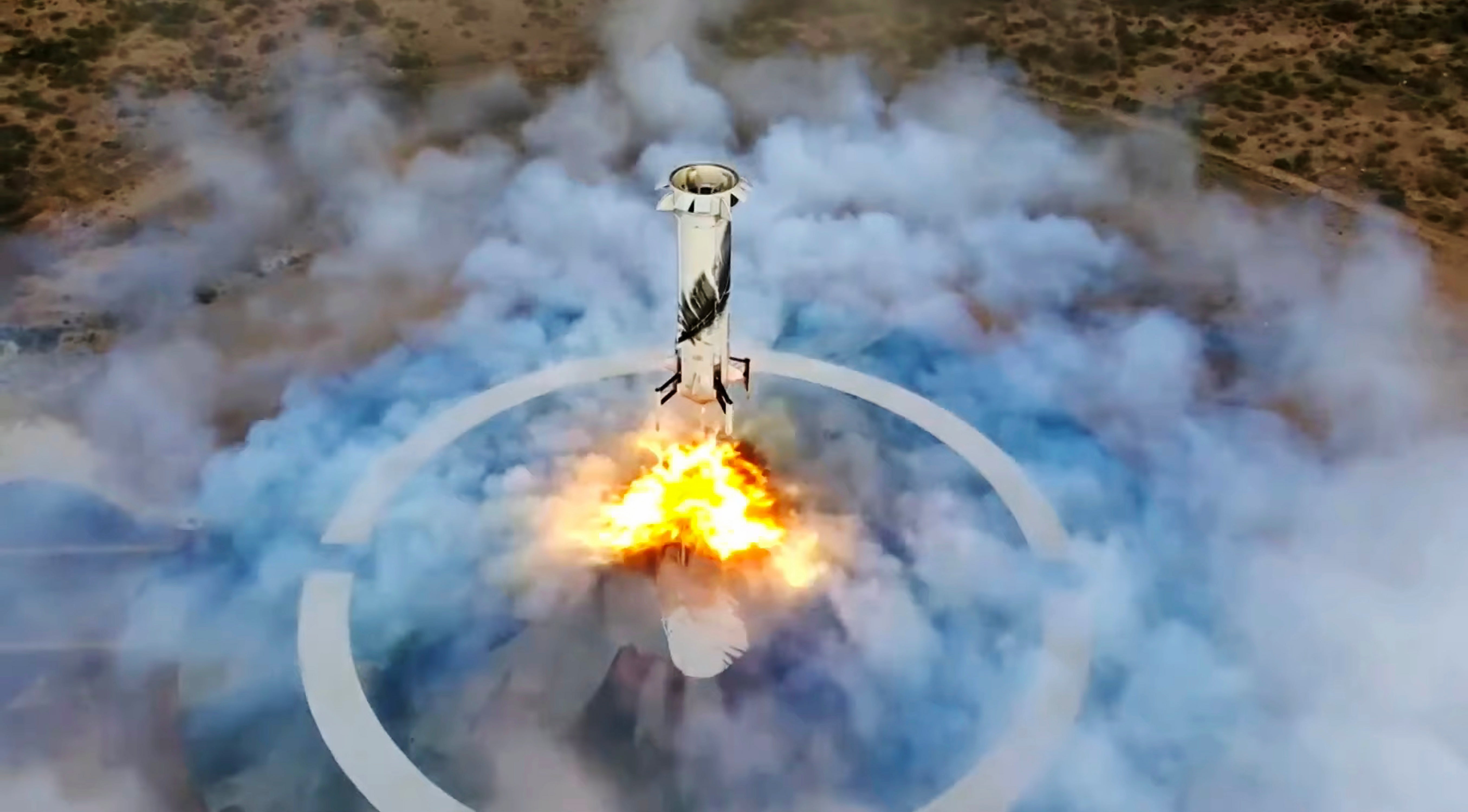 The booster rocket from Blue Origin touches down safely after propelling Bezos to space