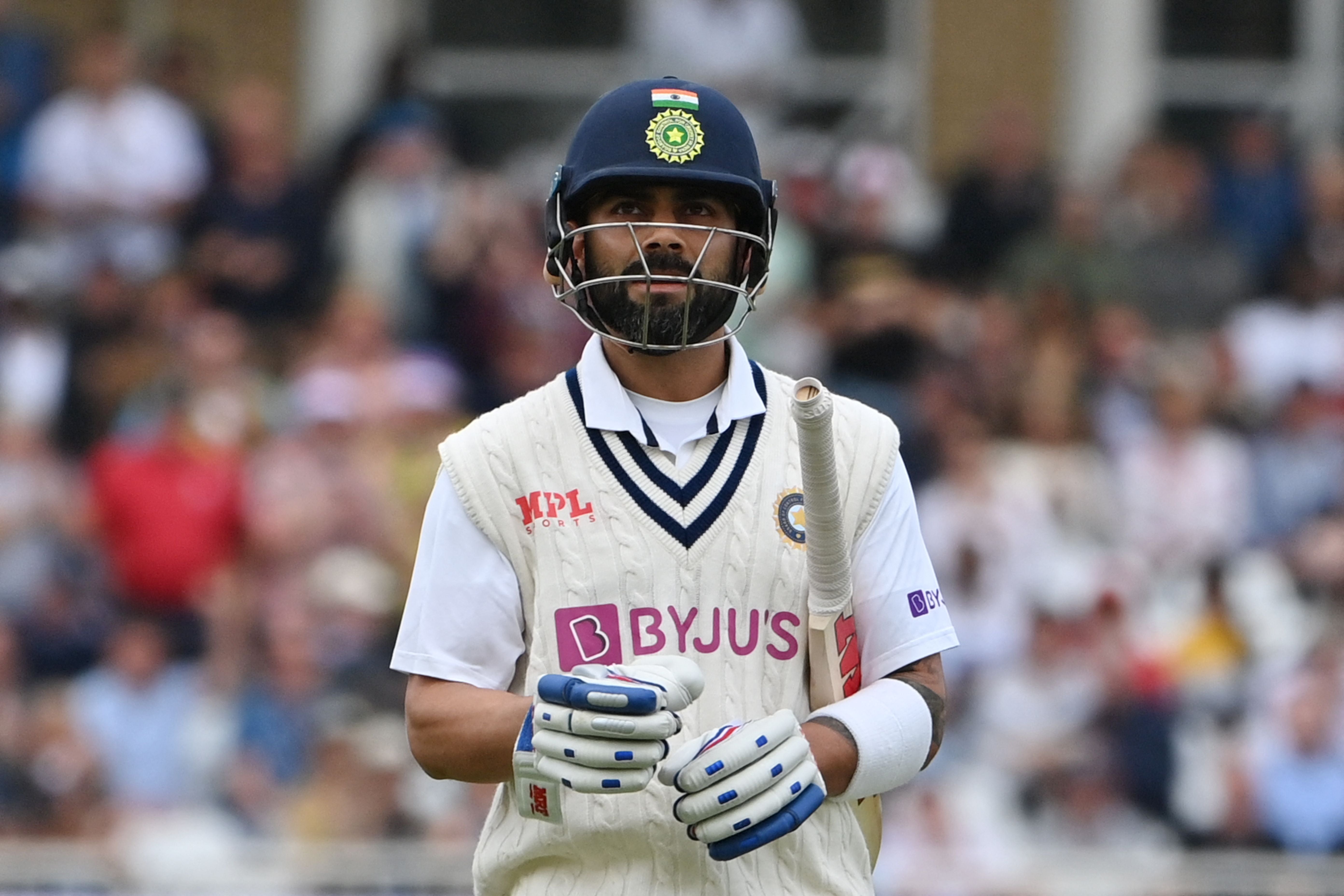 Kohli walks back to the pavilion after getting out for a golden duck