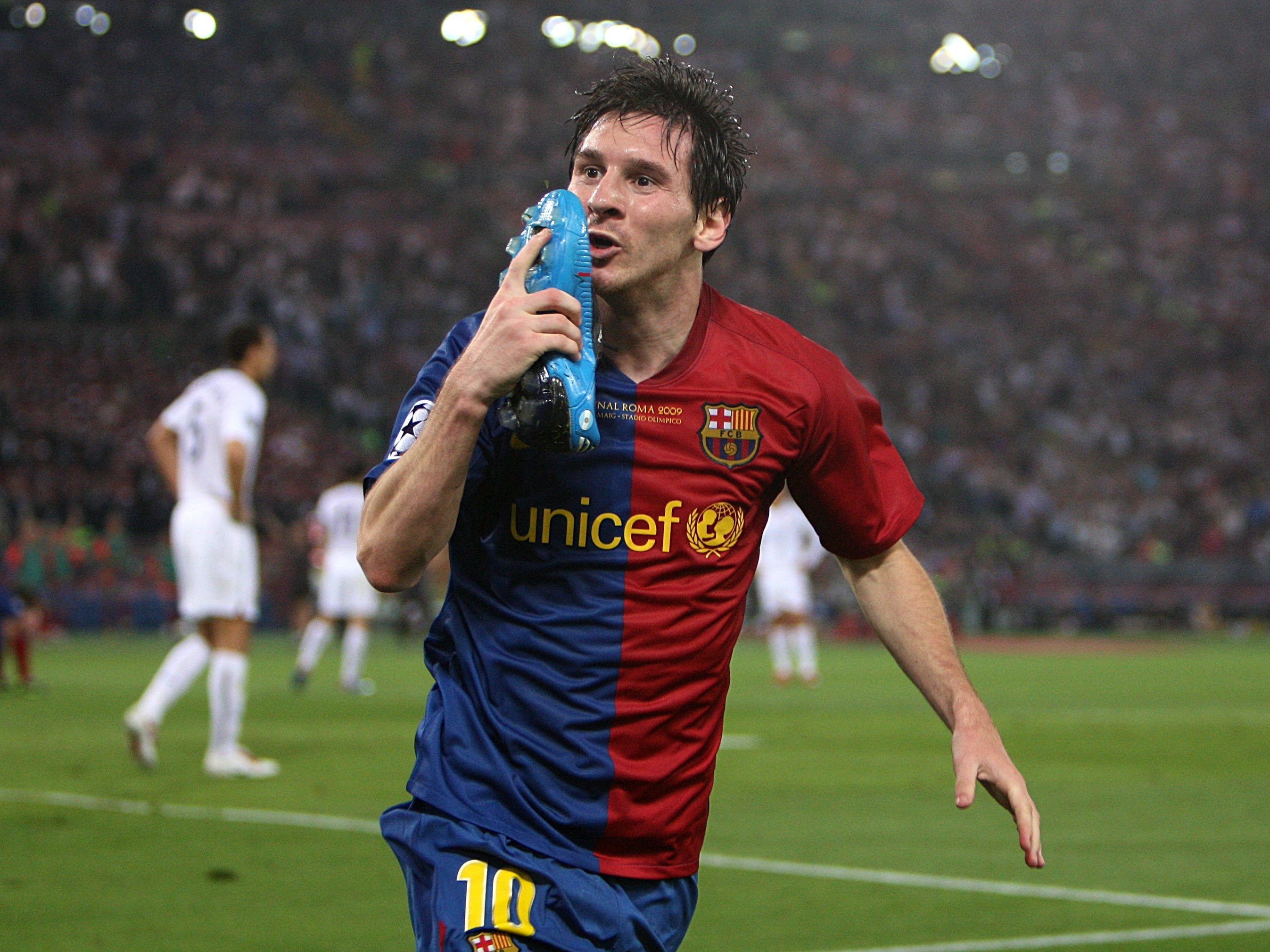 Messi celebrates after heading Barcelona’s second goal against Manchester United in the 2009 Champions League final in Rome (Nick Potts/PA)