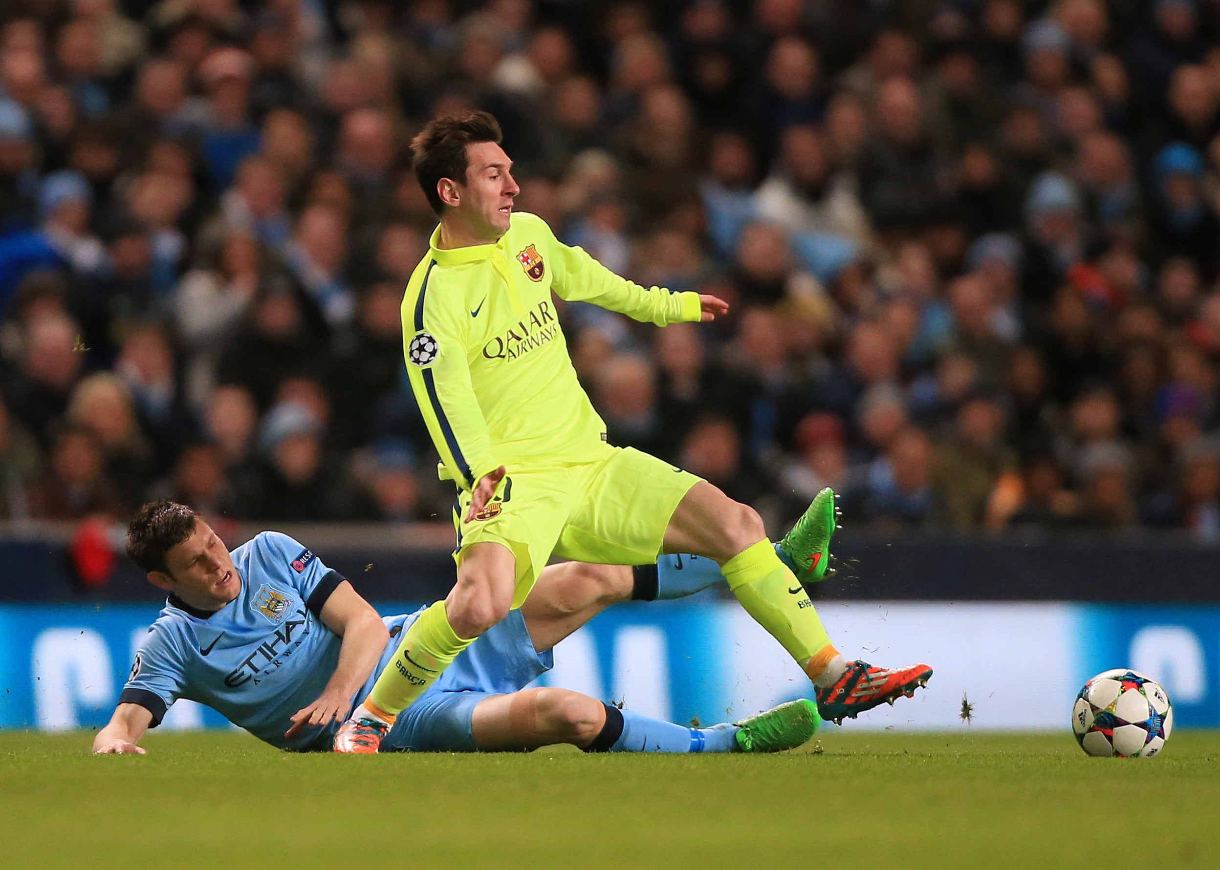 Messi and Manchester City’s James Milner battle for the ball during a Champions League contest at the Etihad in 2015 (PA)