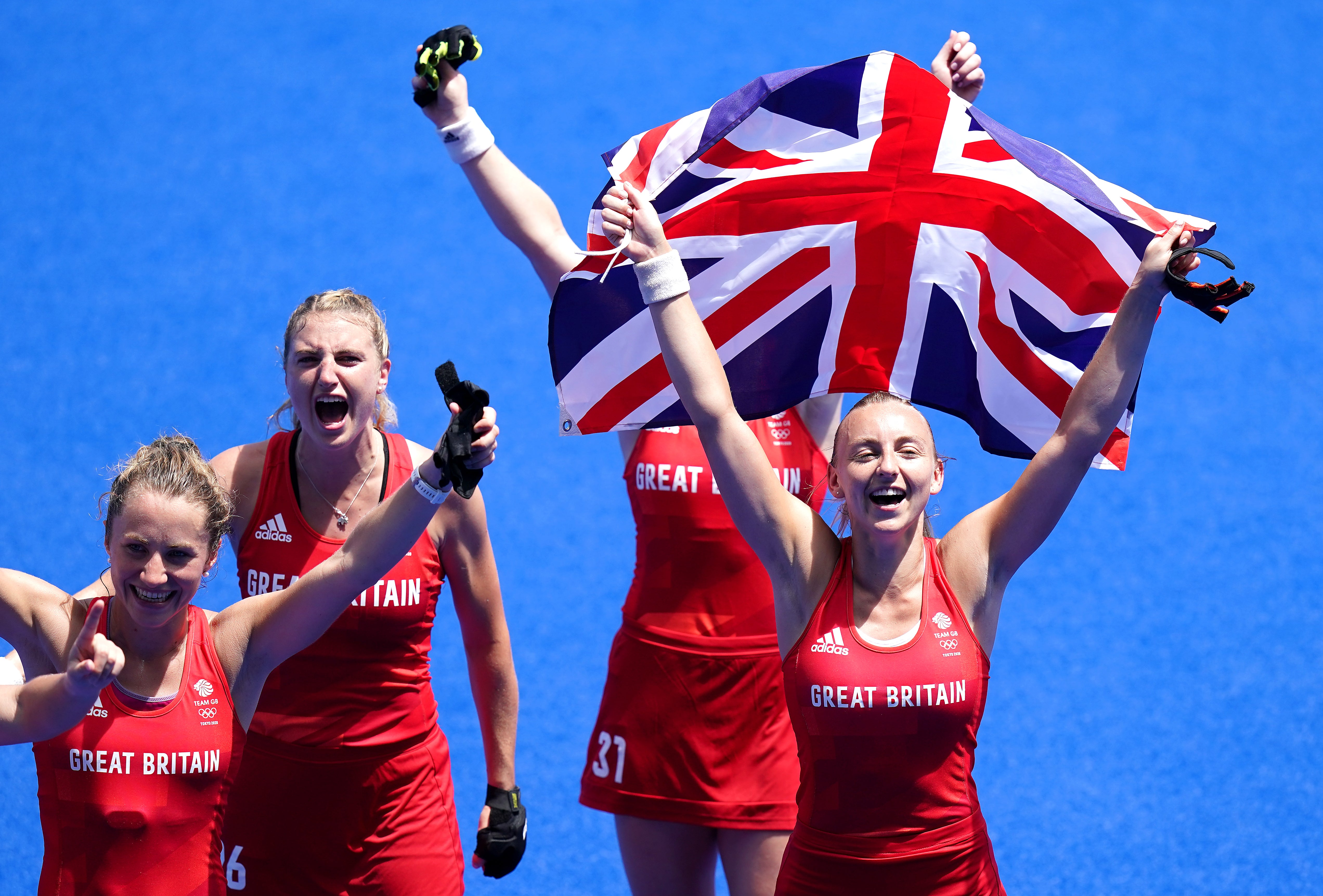 Great Britain hockey players celebrate after beating India (Adam Davy/PA)