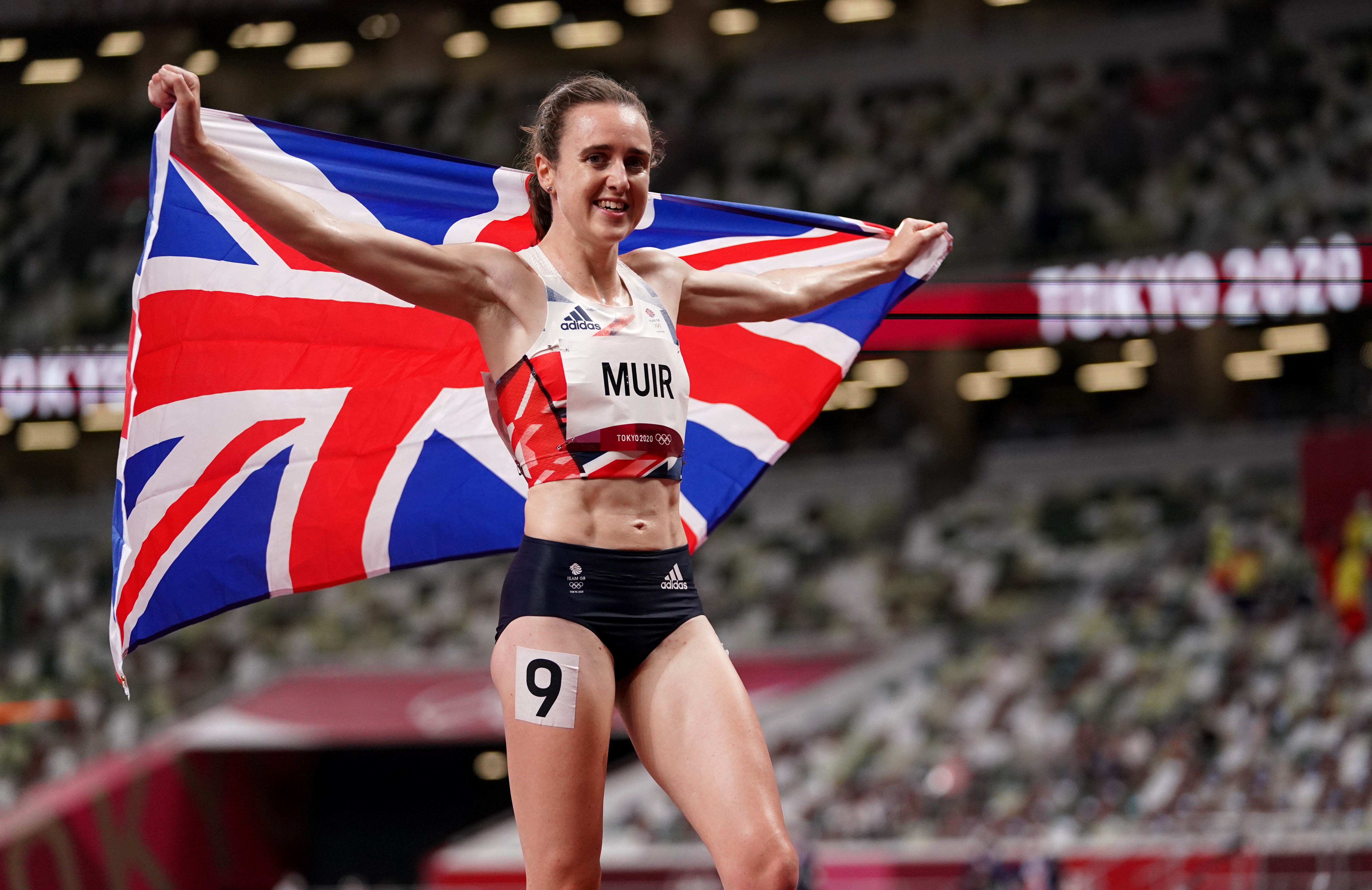 Laura Muir celebrates after winning the silver medal