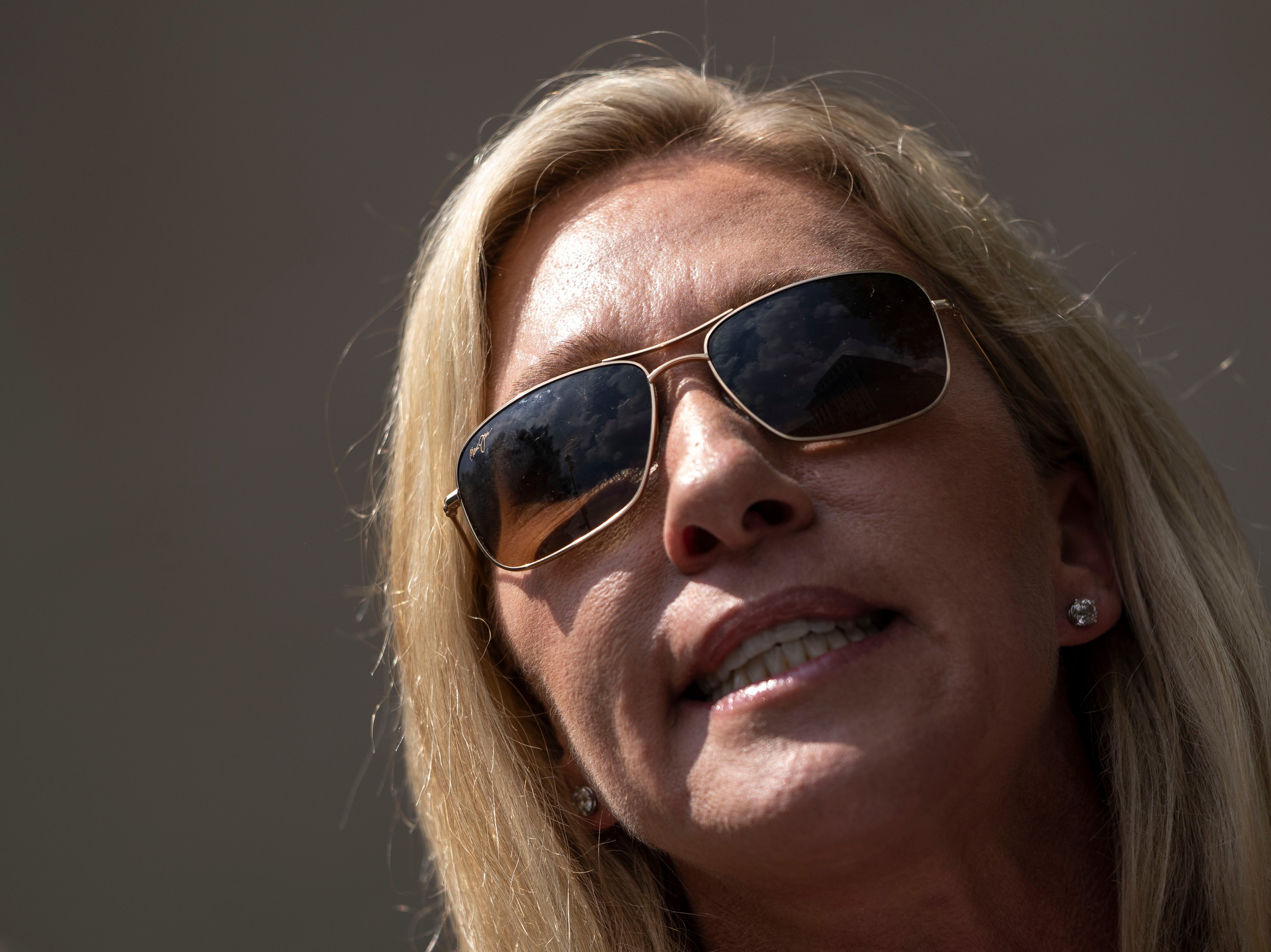 Marjorie Taylor Greene caught on camera telling crowd to scare off vaccination promoters with guns