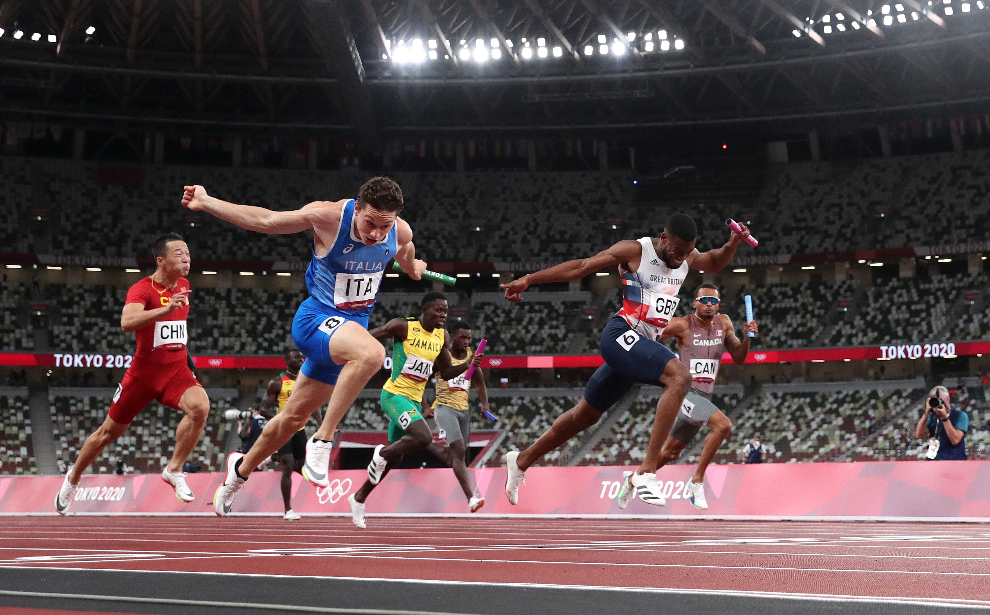 Nethaneel Mitchell-Blake of GB is beaten at the line