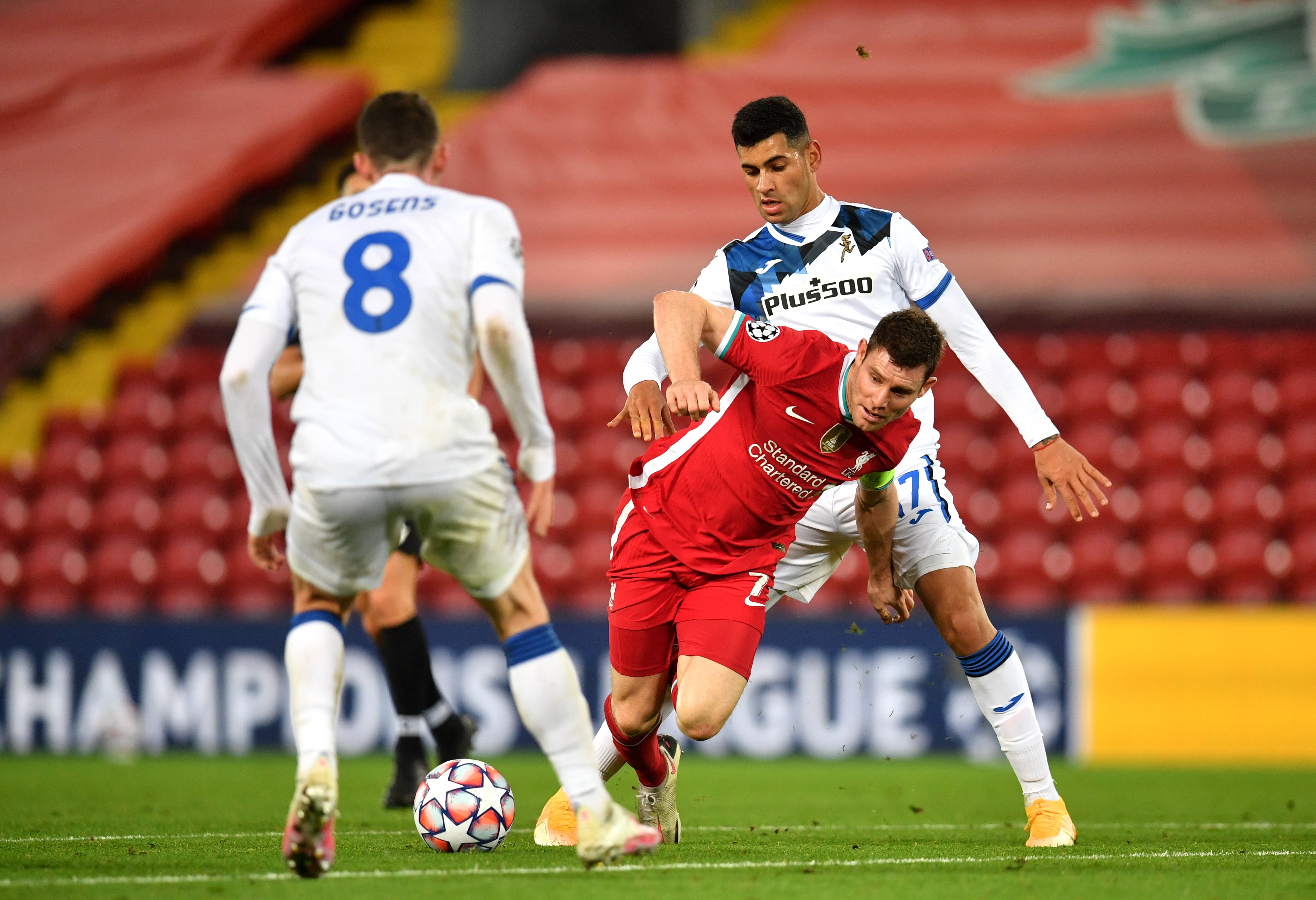 Cristian Romero (right) in action against Liverpool (Paul Ellis/PA)