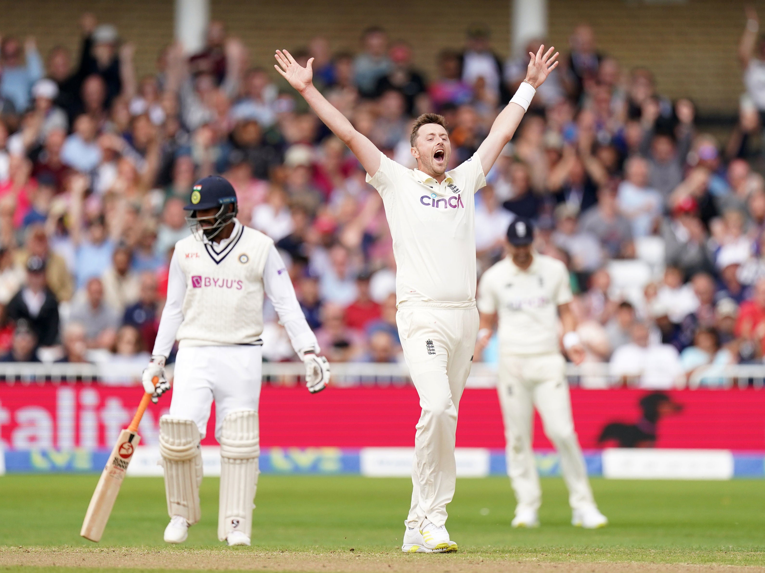 Ollie Robinson celebrates after taking the wicket of Jasprit Bumrah