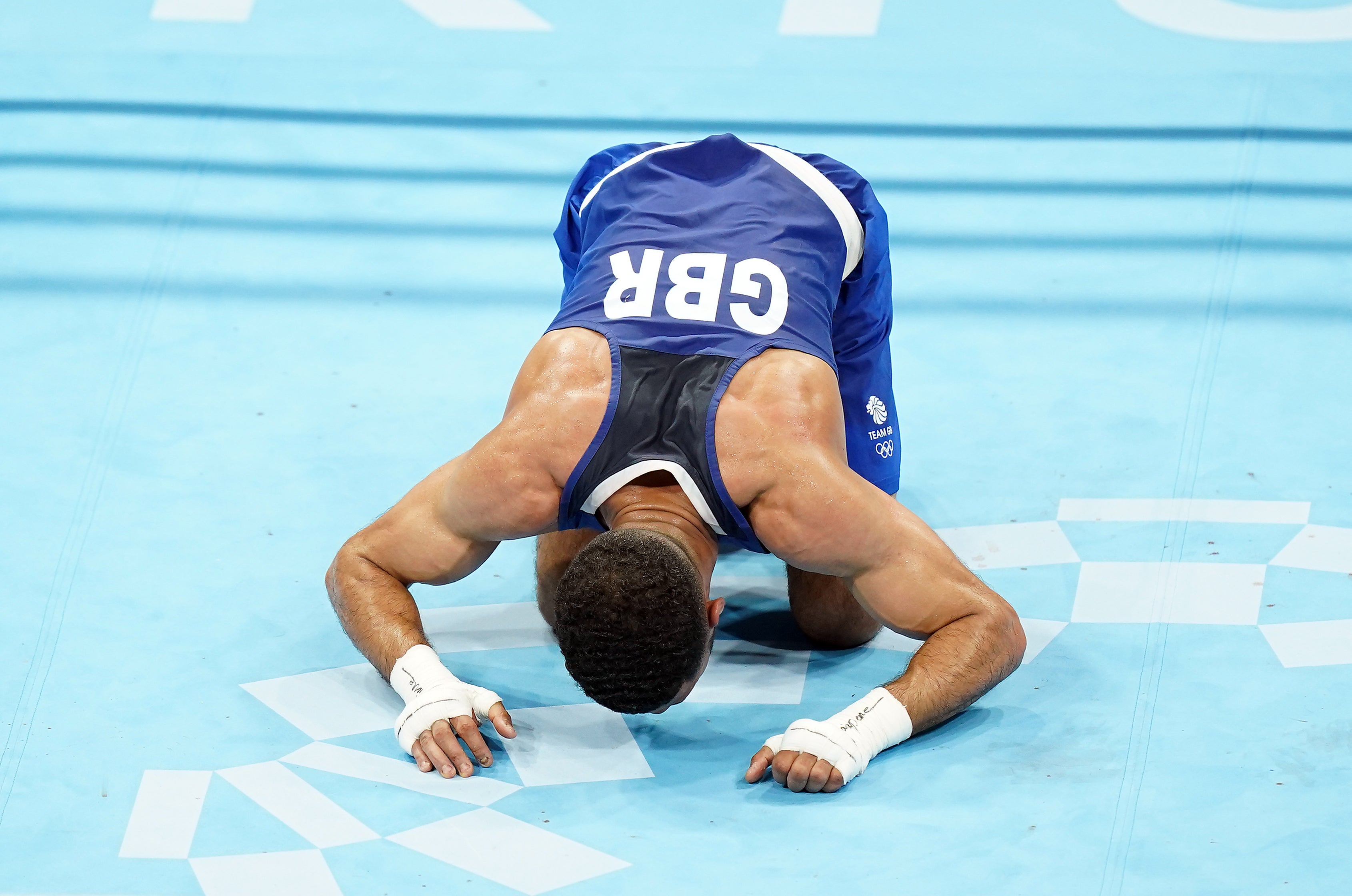 Yafai bangs on the canvas in delight after gaining the judges’ verdict