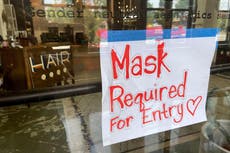 Weary US businesses confront new round of mask mandates