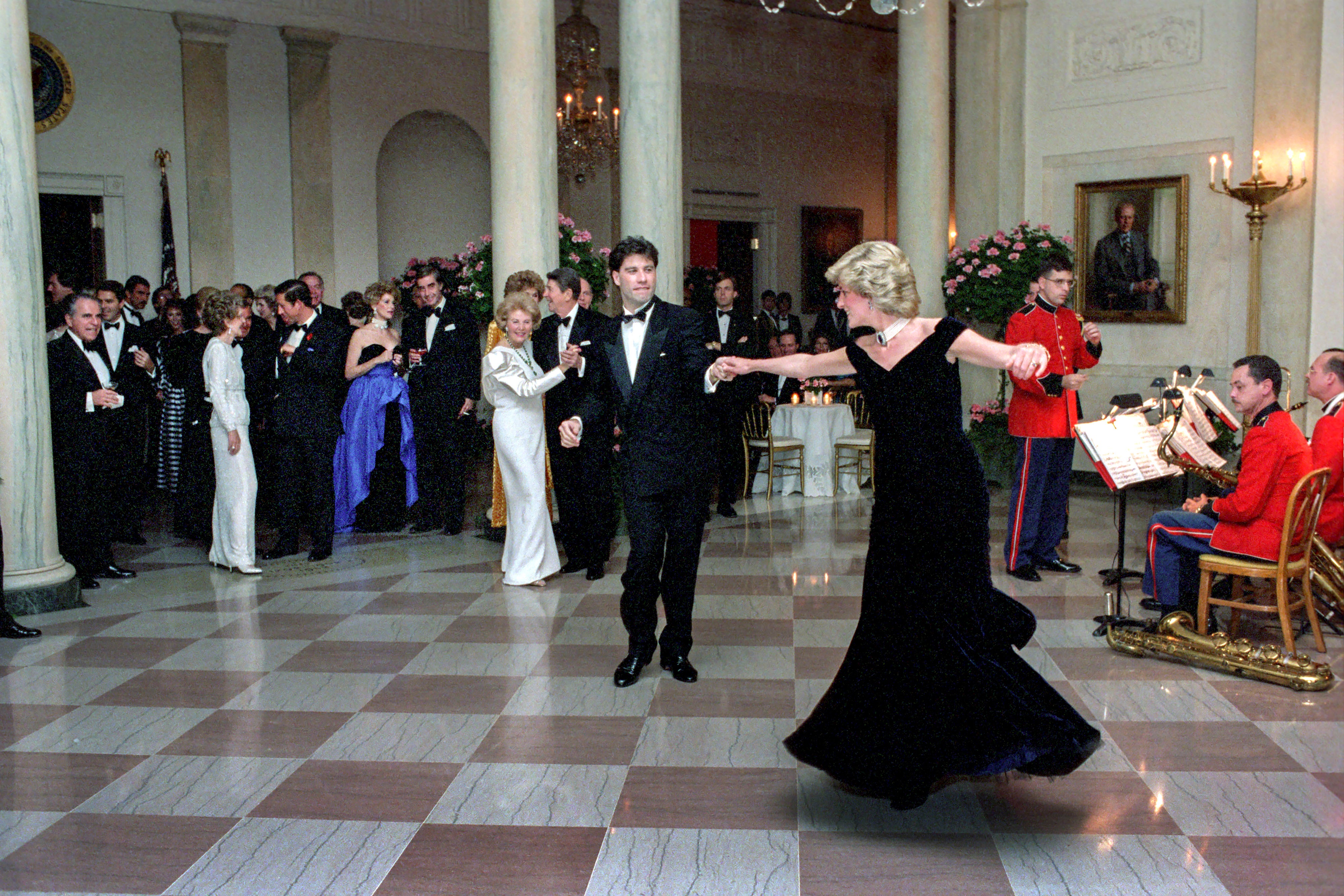 Diana dancing with John Travolta at at the White House in 1985