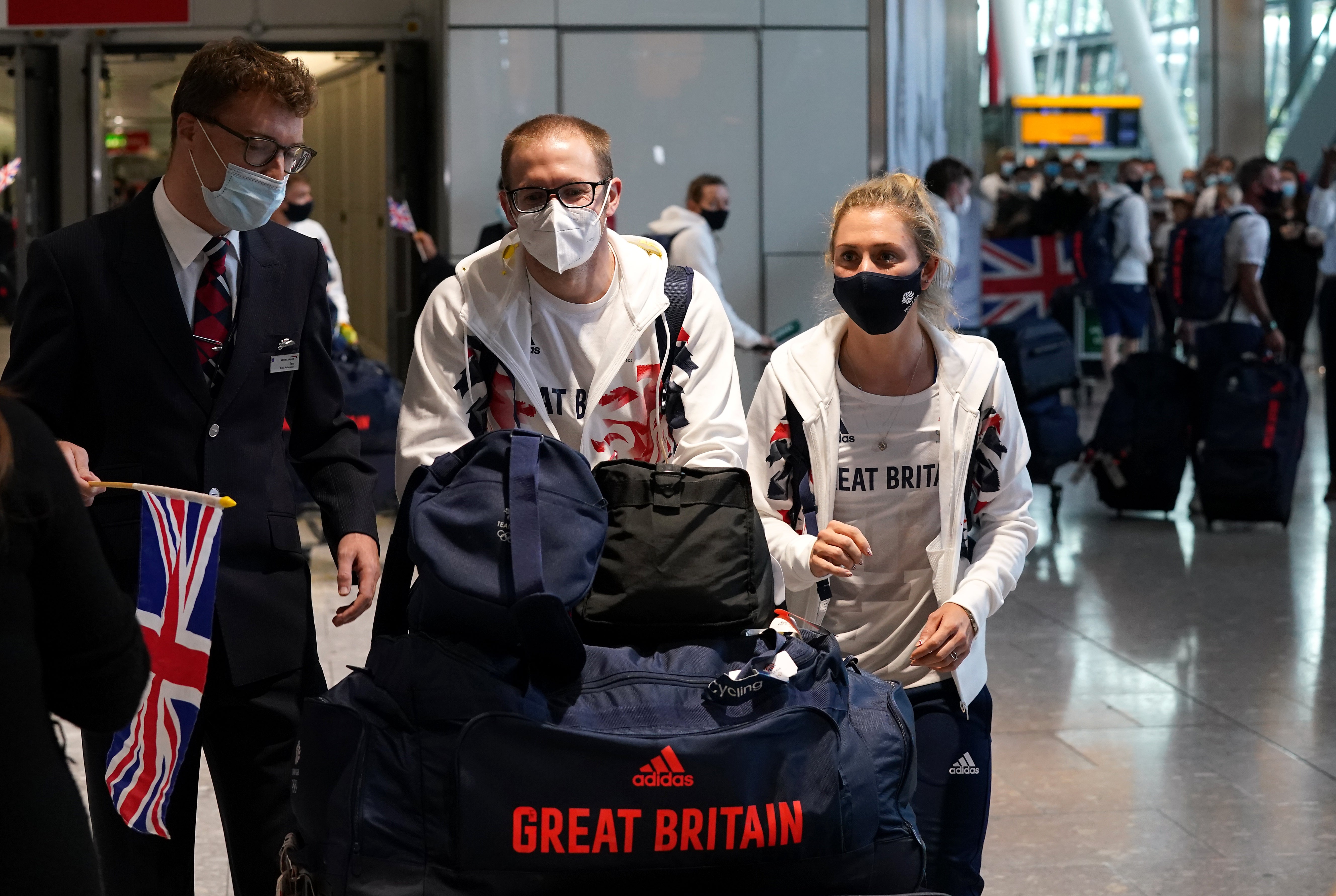 Laura and Jason Kenny were first off the plane (Steve Parsons/PA)