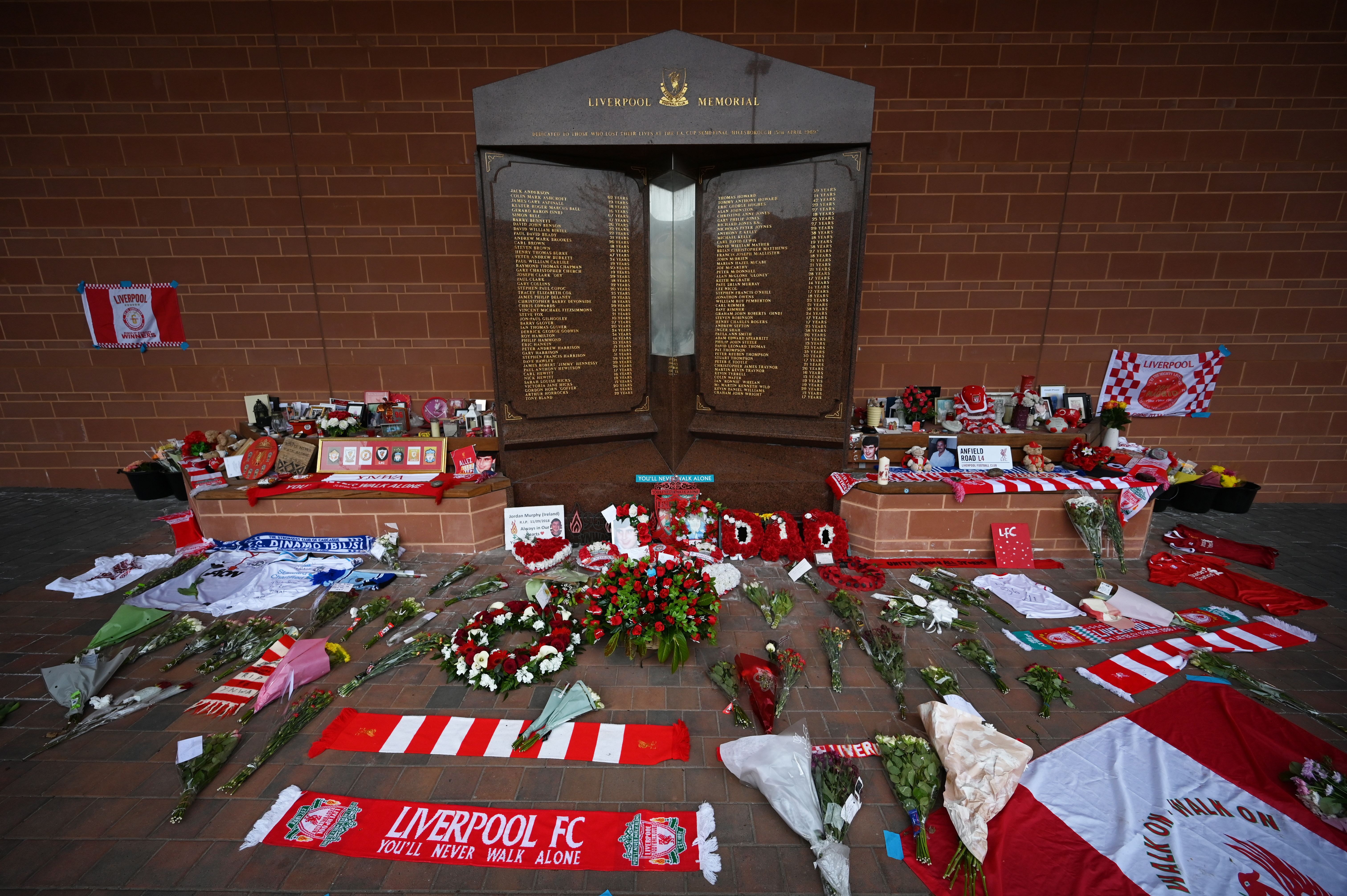 Tributes laid around the memorial to those who were killed in the 1989 Hillsborough Stadium disaster