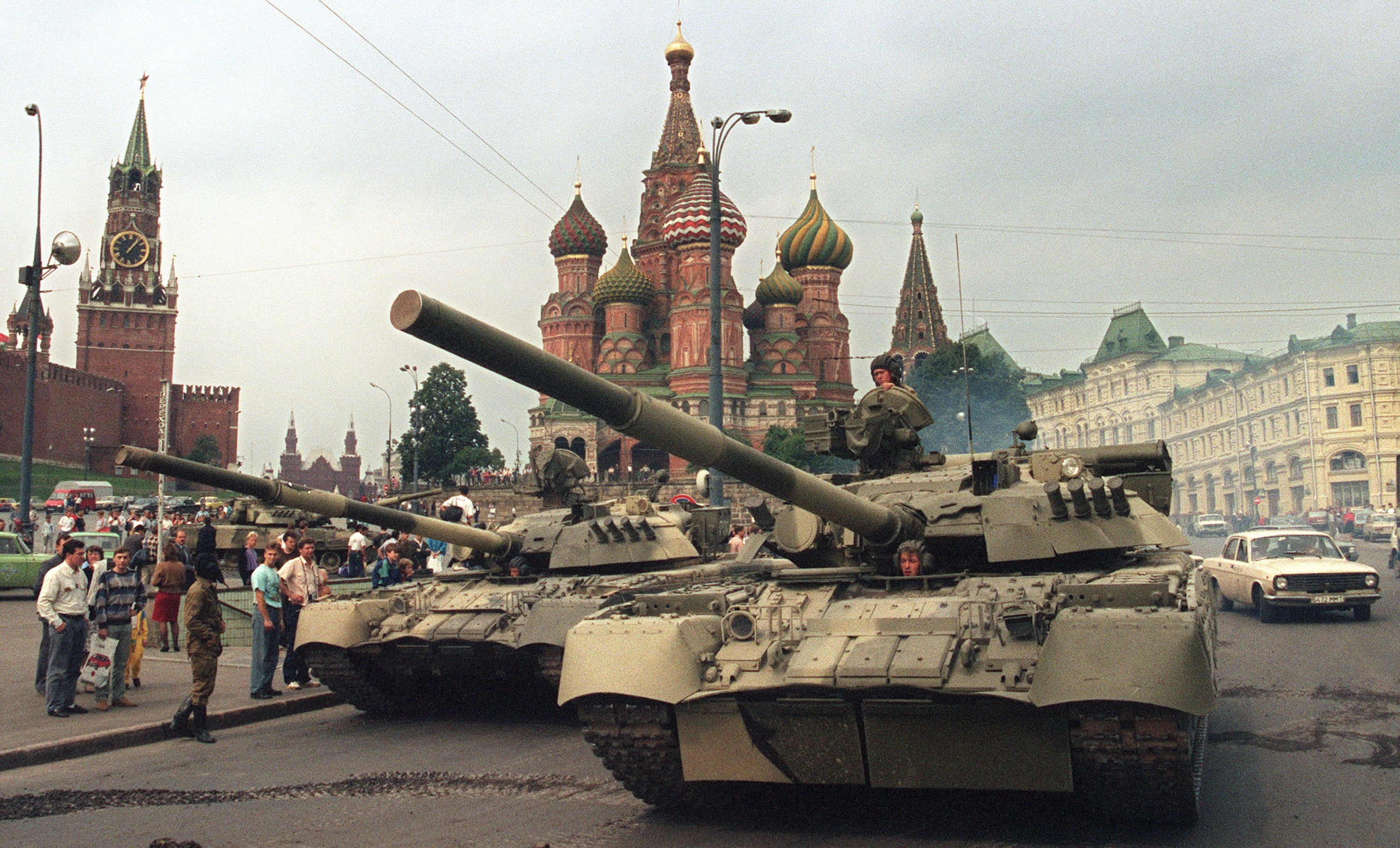 Private cars threaded around the military convoy with very little disruption