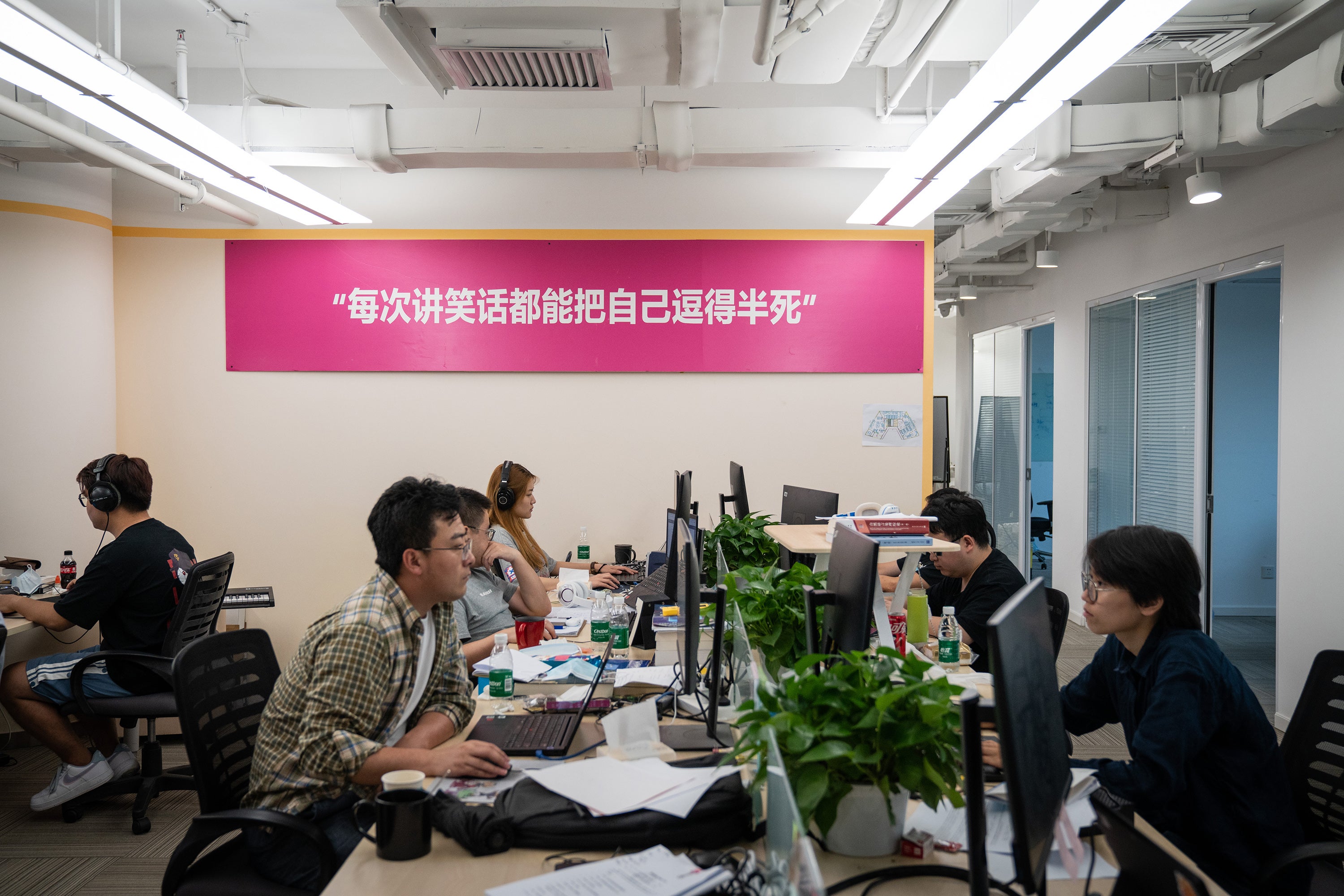 A quote from Xiaoice that reads, ‘I always laugh every time I crack a joke’ is displayed in the Beijing office of the company that created the popular chatbot