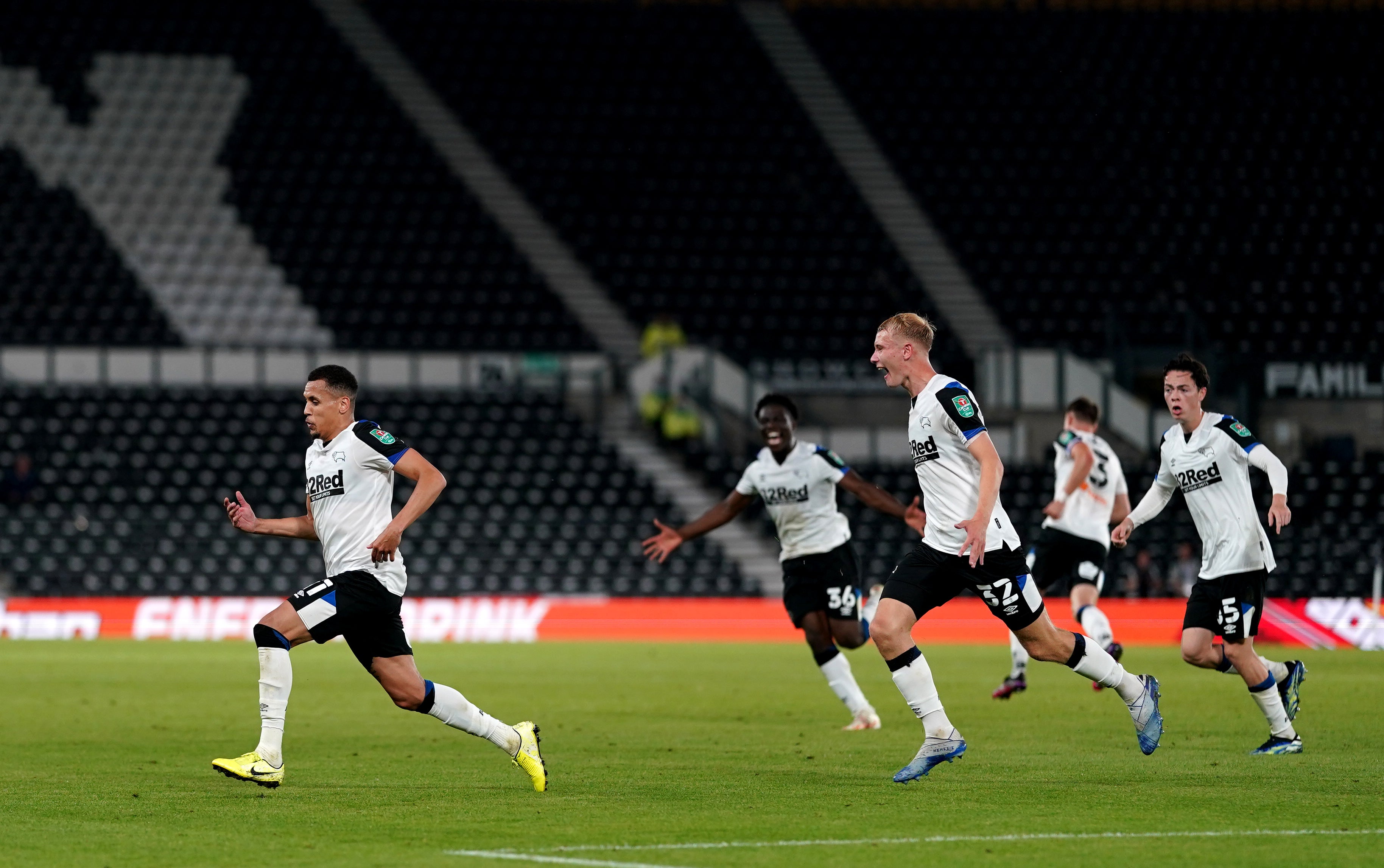 Ravel Morrison (left) celebrates scoring on his debut for Derby against Salford (Tim Goode/PA)