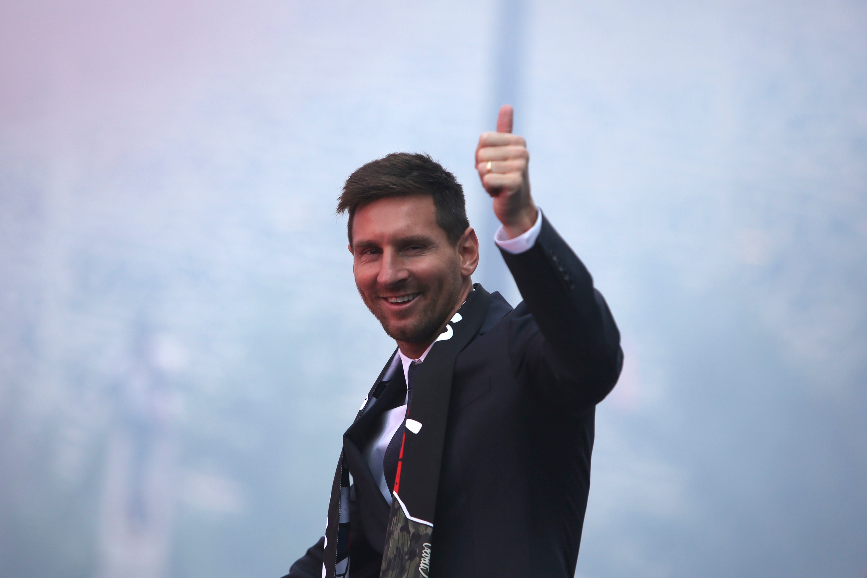 Lionel Messi was greeted by PSG fans outside the Parc des Princes on Wednesday (Rafael Yaghobzadeh/AP)