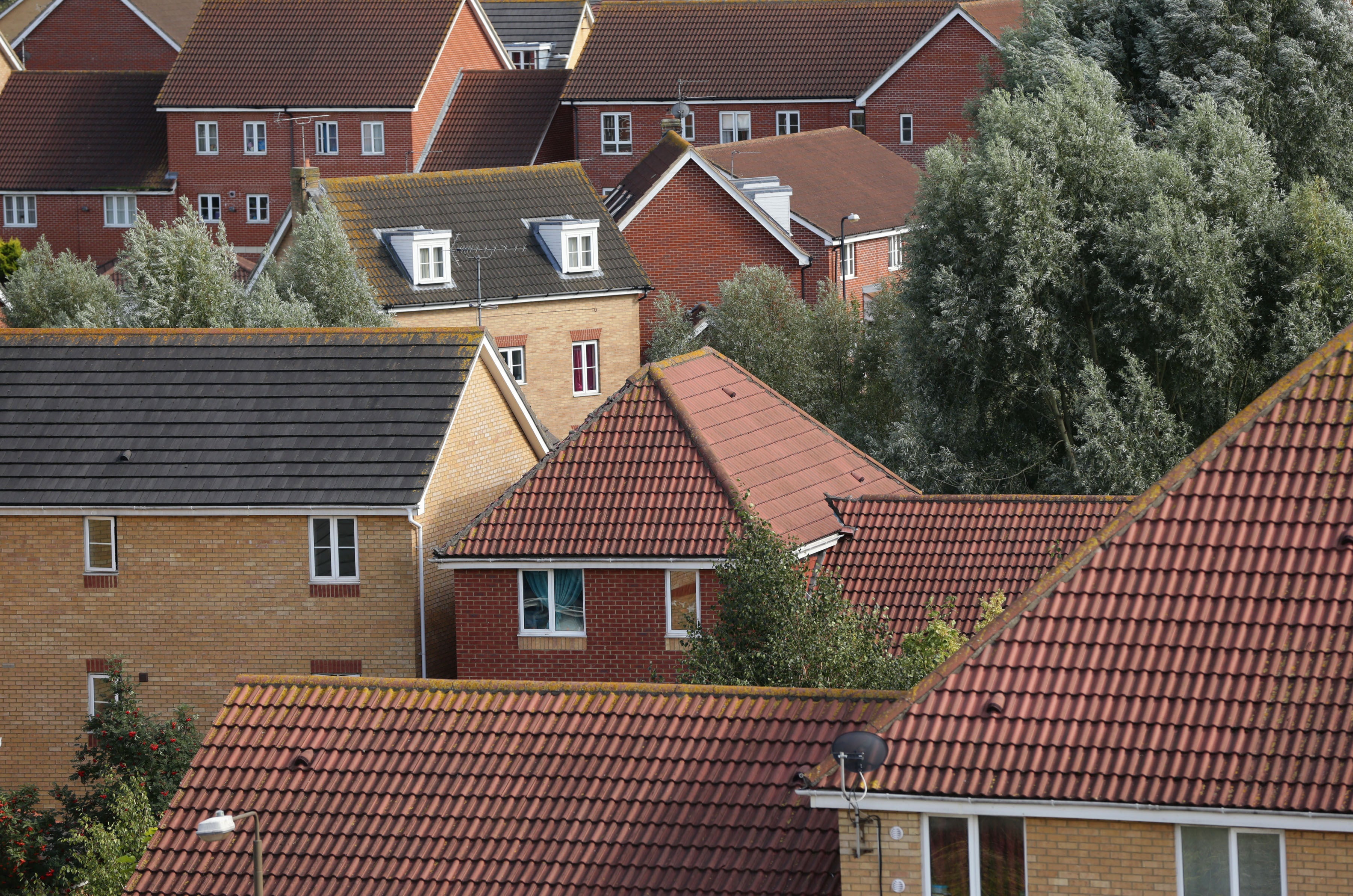 The average price tag on a detached home has increased by around 23 times that of a flat in cash terms during the coronavirus pandemic (Yui Mok/PA)