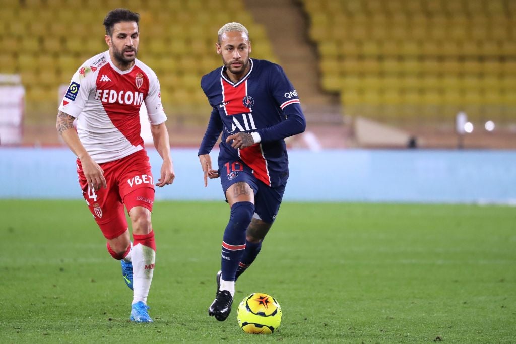 Fabregas tracks PSG’s Neymar during their Ligue 1 meeting last November