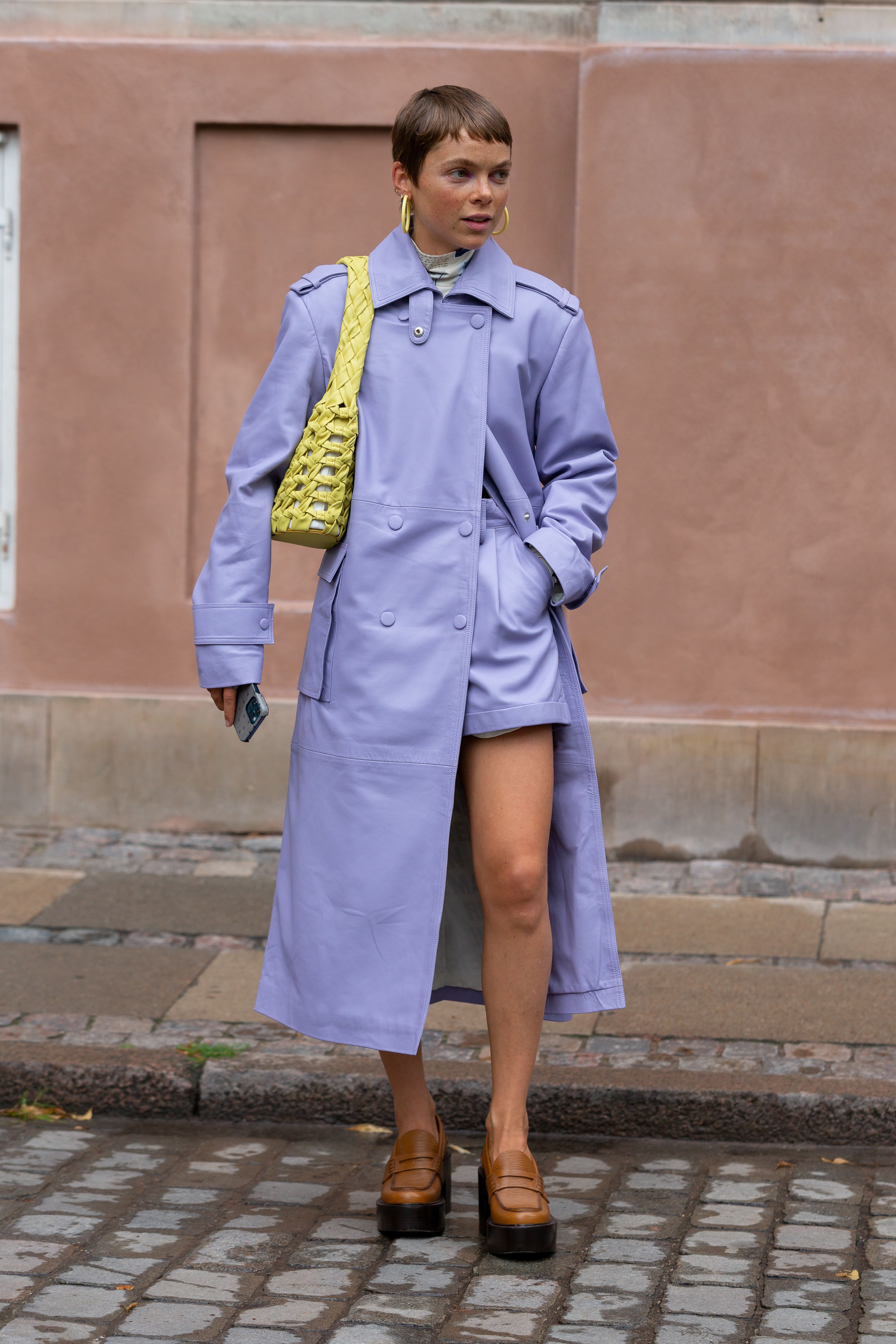 A monochrome lilac look, paired with bright yellow accessories