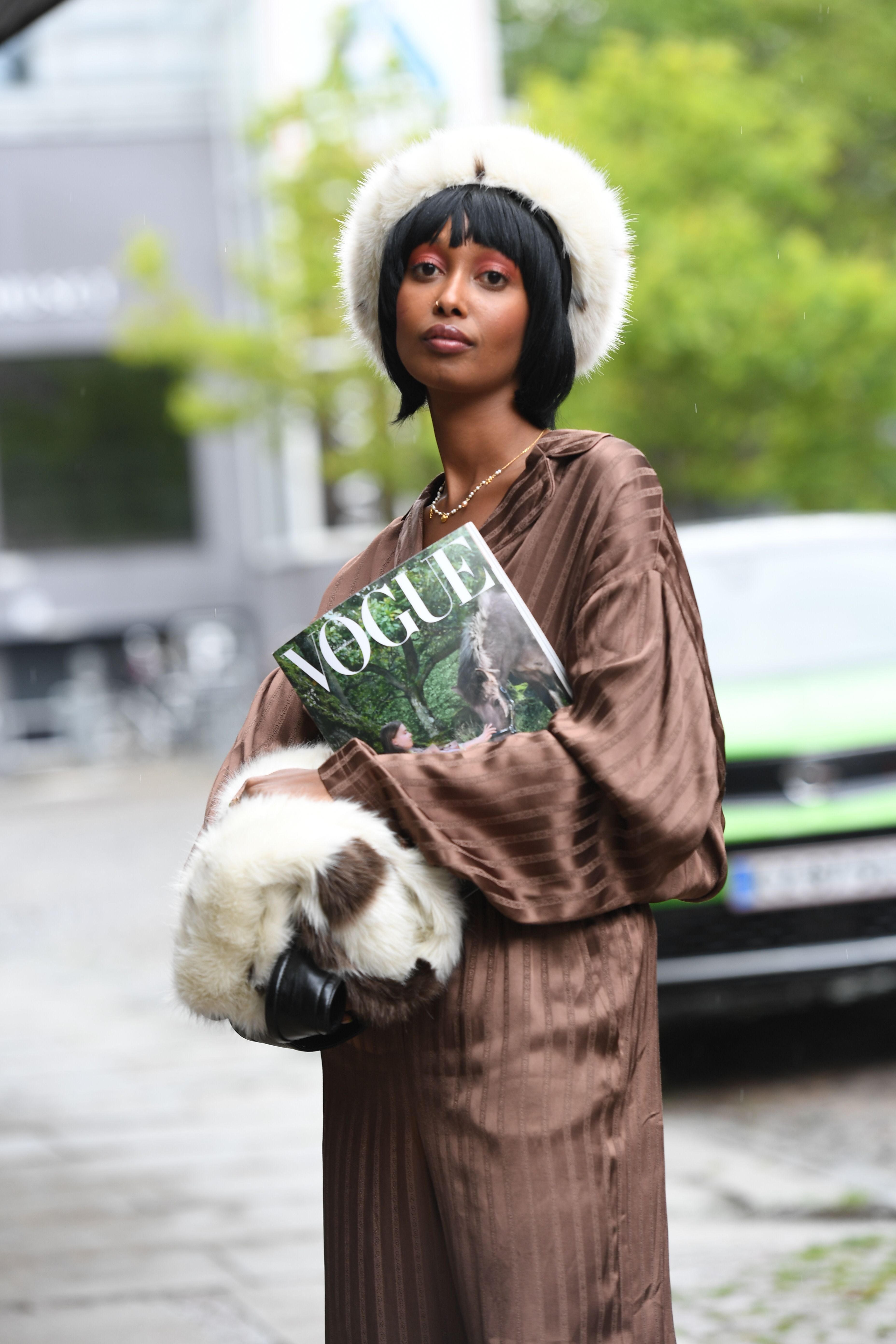 An all brown look with faux fur accessories