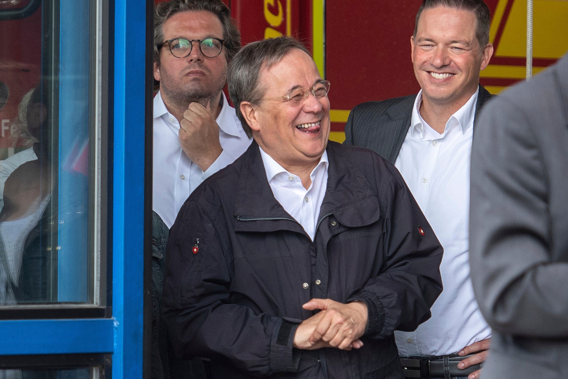 Armin Laschet was pictured laughing as President Steinmeier spoke about the floods