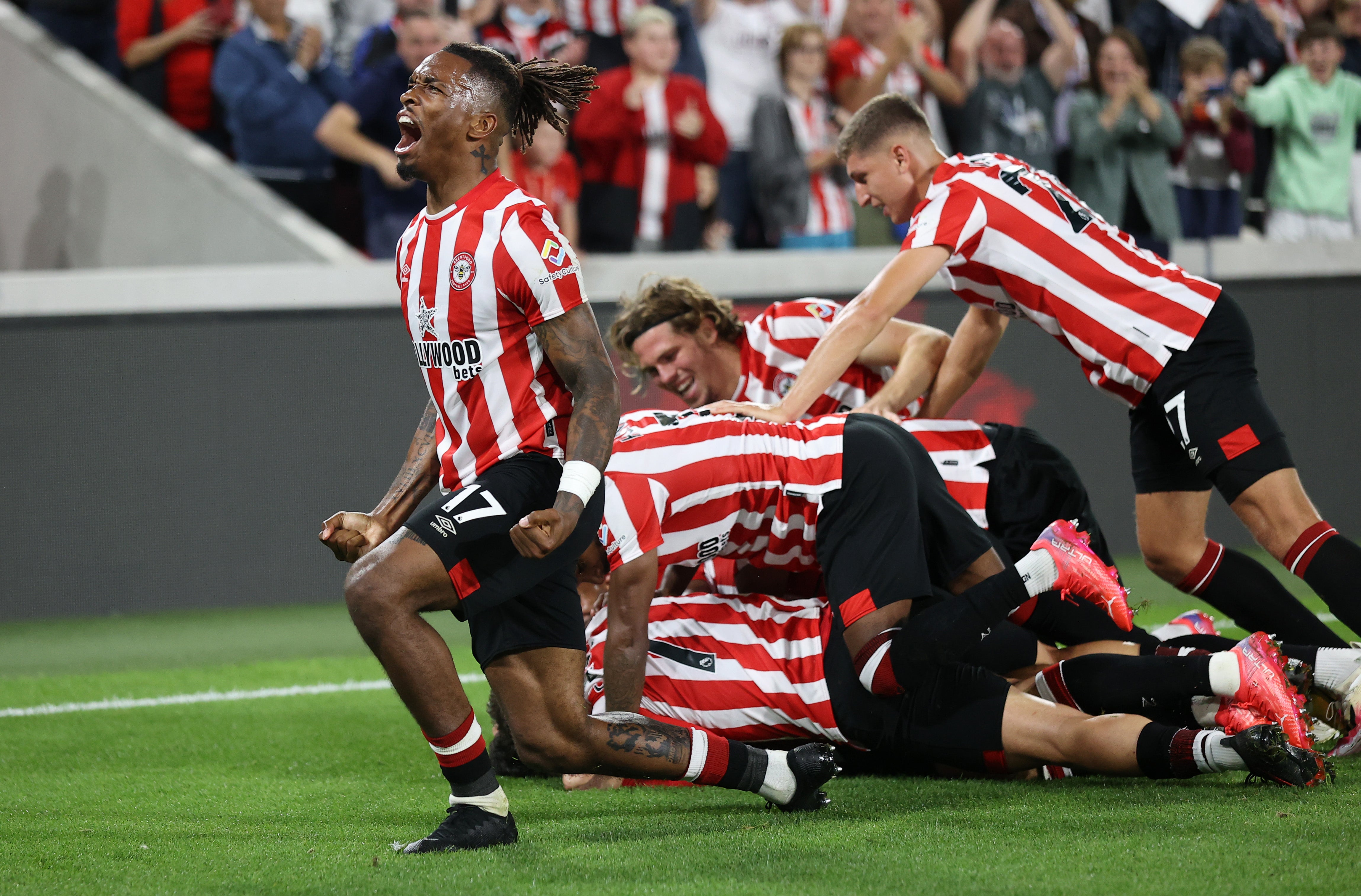 Brentford and Ivan Toney celebrate their second goal against Arsenal