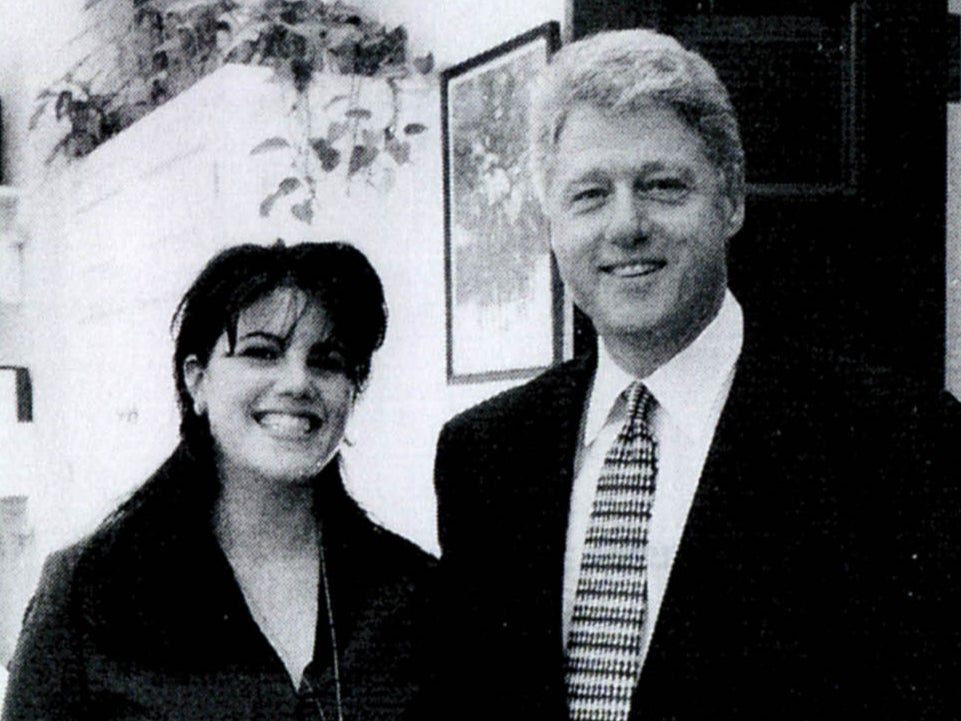 A photograph showing former White House intern Monica Lewinsky meeting President Bill Clinton at a White House function submitted as evidence in documents by the Starr investigation and released by the House Judiciary committee on 21 September 1998