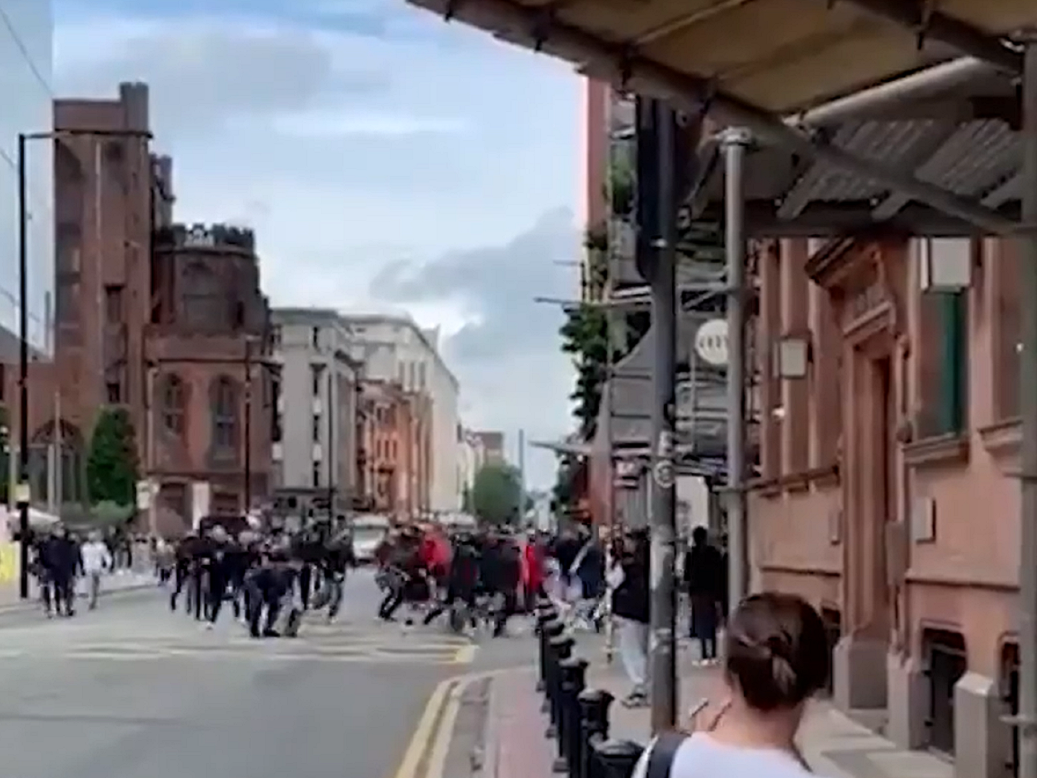Manchester United and Leeds football fans clash in Manchester City Centre ahead of Premier League opener
