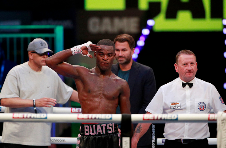 Joshua Buatsi (centre) and promoter Eddie Hearn (behind)