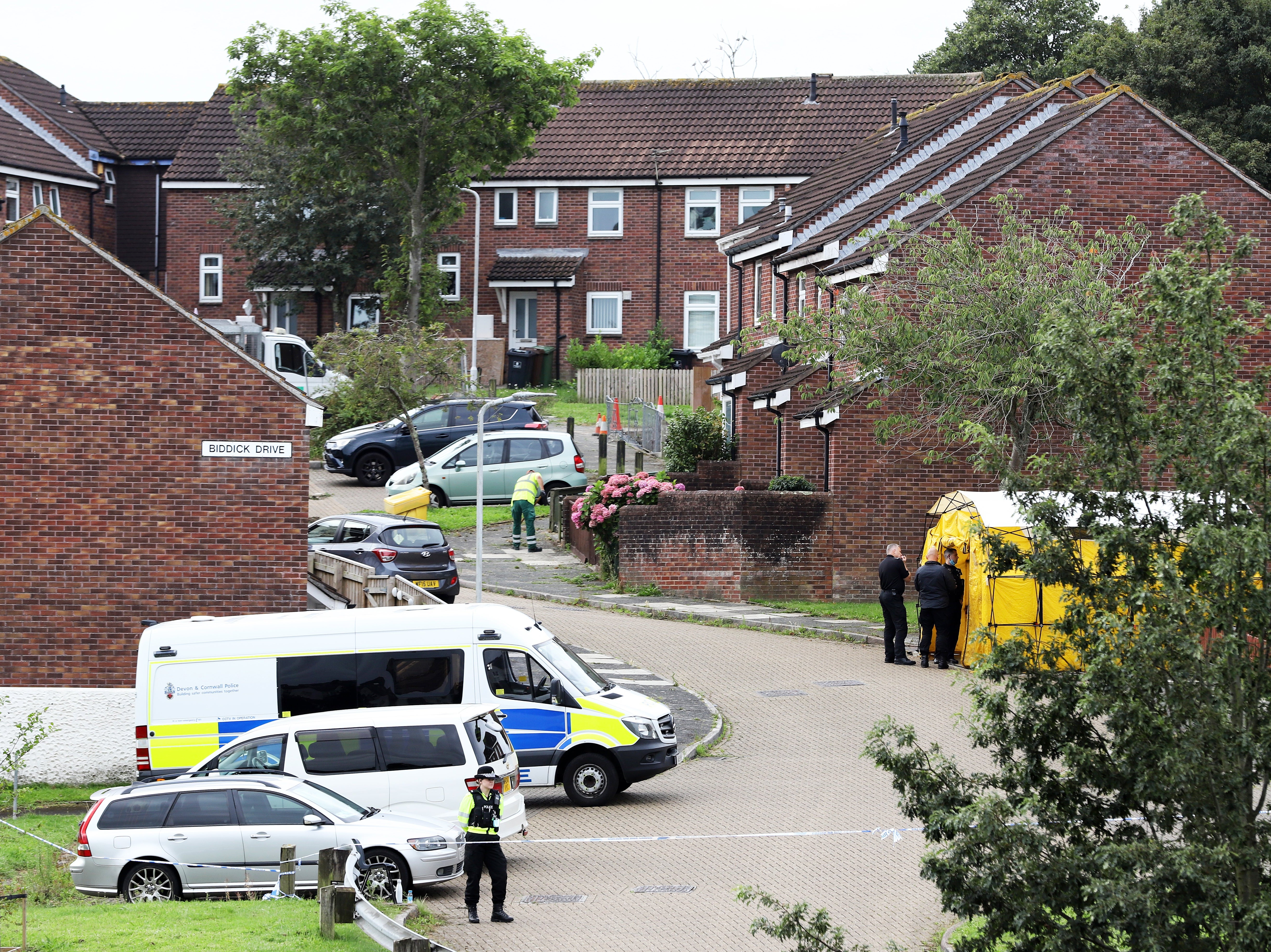 Police at the cordoned-off Biddick Drive in Keyham, Plymouth, on Sunday