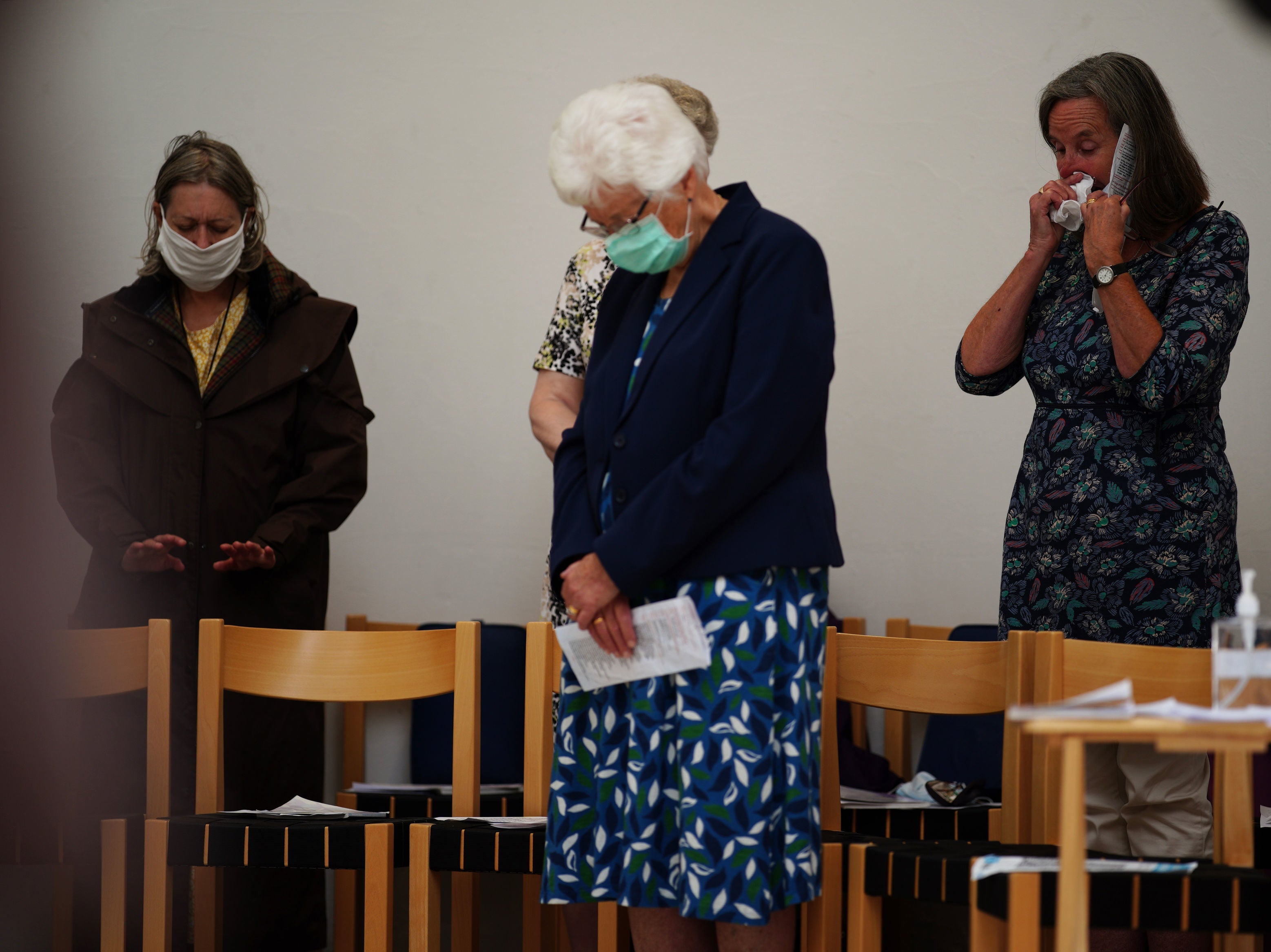 People attend a service at St Thomas Church in Keyham, Plymouth, Devon, where five people were killed by gunman Jake Davison