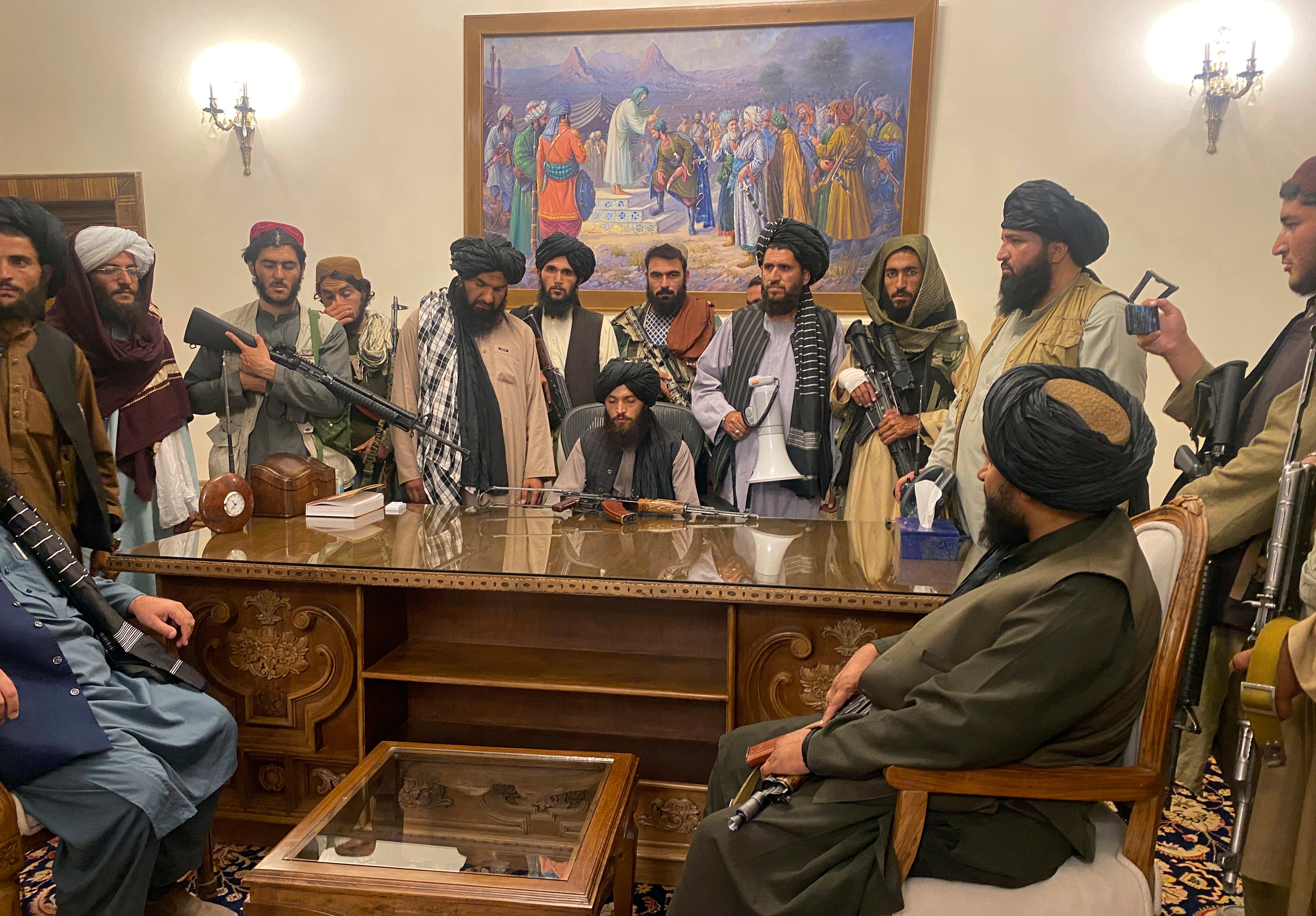 Taliban fighters take control of Afghan presidential palace after the Afghan President Ashraf Ghani fled the country